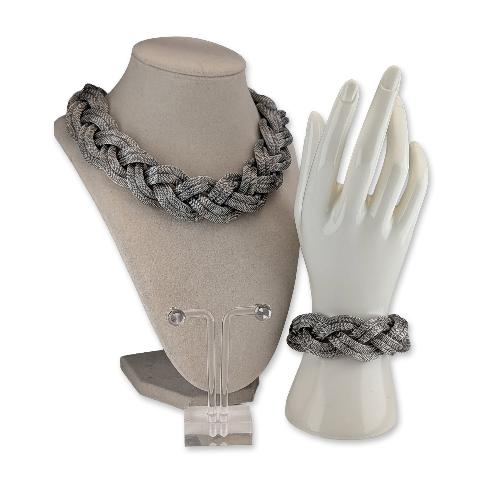 3pc Stainless Steel and Silver-Tone Braided Mesh Jewelry Items: Three-piece jewelry group in silver-tone, featuring multi-strand braided metal mesh construction. The set consists of a collar necklace, matching bracelet, and a pair of textured circular stud earring