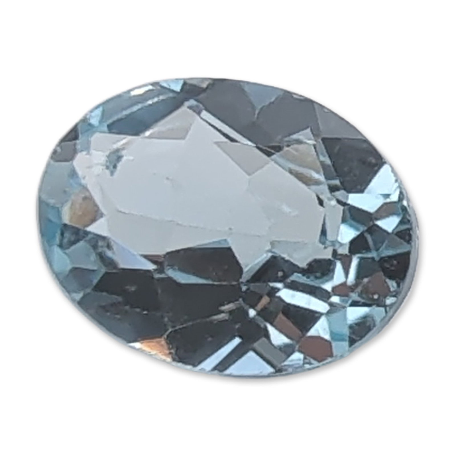 Faceted Light Blue Oval Topaz Gemstone: Faceted gemstone in transparent light sky blue, appearing consistent with aquamarine or sky blue topaz. The stone features an oval faceted cut with light-returning facets. 1.3 carats 7.9mm Dimensions: