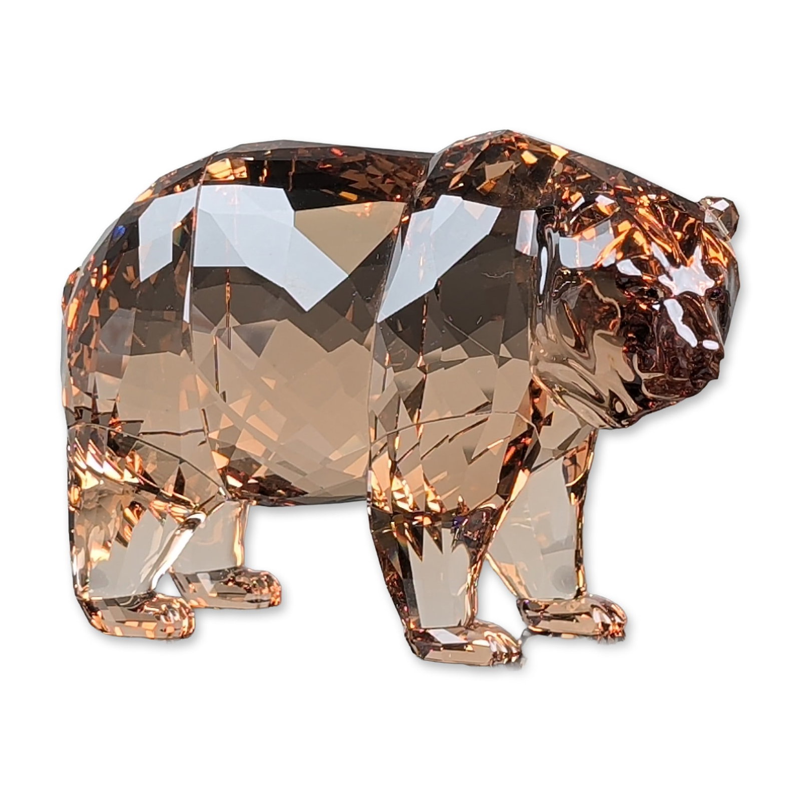 Swarovski SCS 2017 Annual Edition Crystal Figurine, Arcadia Bear: Swarovski Crystal Society (SCS) annual edition figurine, the 2017 Bear Arcadia. Faceted Sunray brown lead crystal bear in a walking pose. Features a stylized, faceted body with naturalistic treatment 
