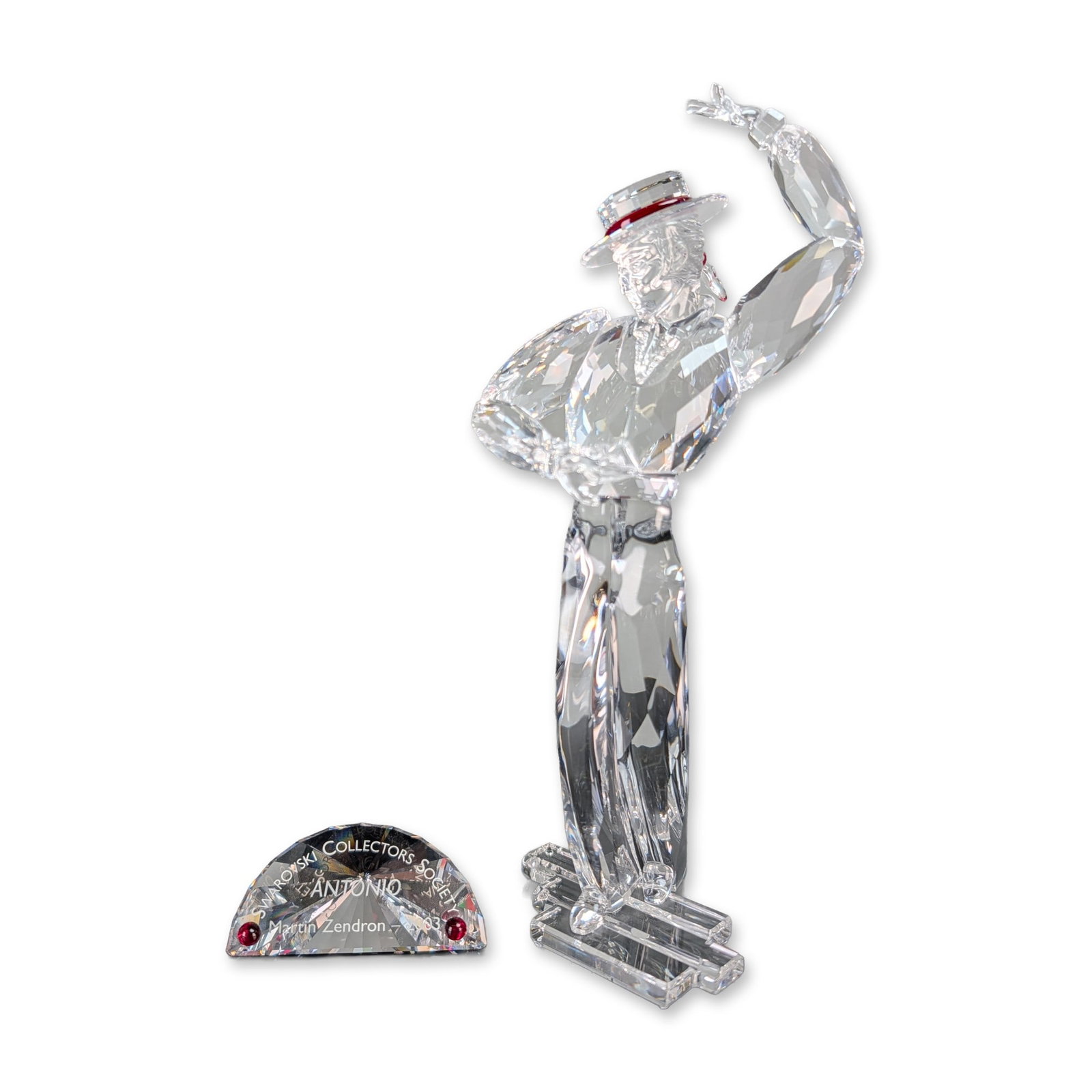 2pc Swarovski SCS 2003 Magic of Dance Antonio Crystal Figurine w/ Plaque: Swarovski crystal figurine titled Antonio, the 2003 Annual Edition for the Swarovski Collectors Society (SCS) and part of the Magic of Dance trilogy. Designed by Martin Zendron, the faceted clear crys