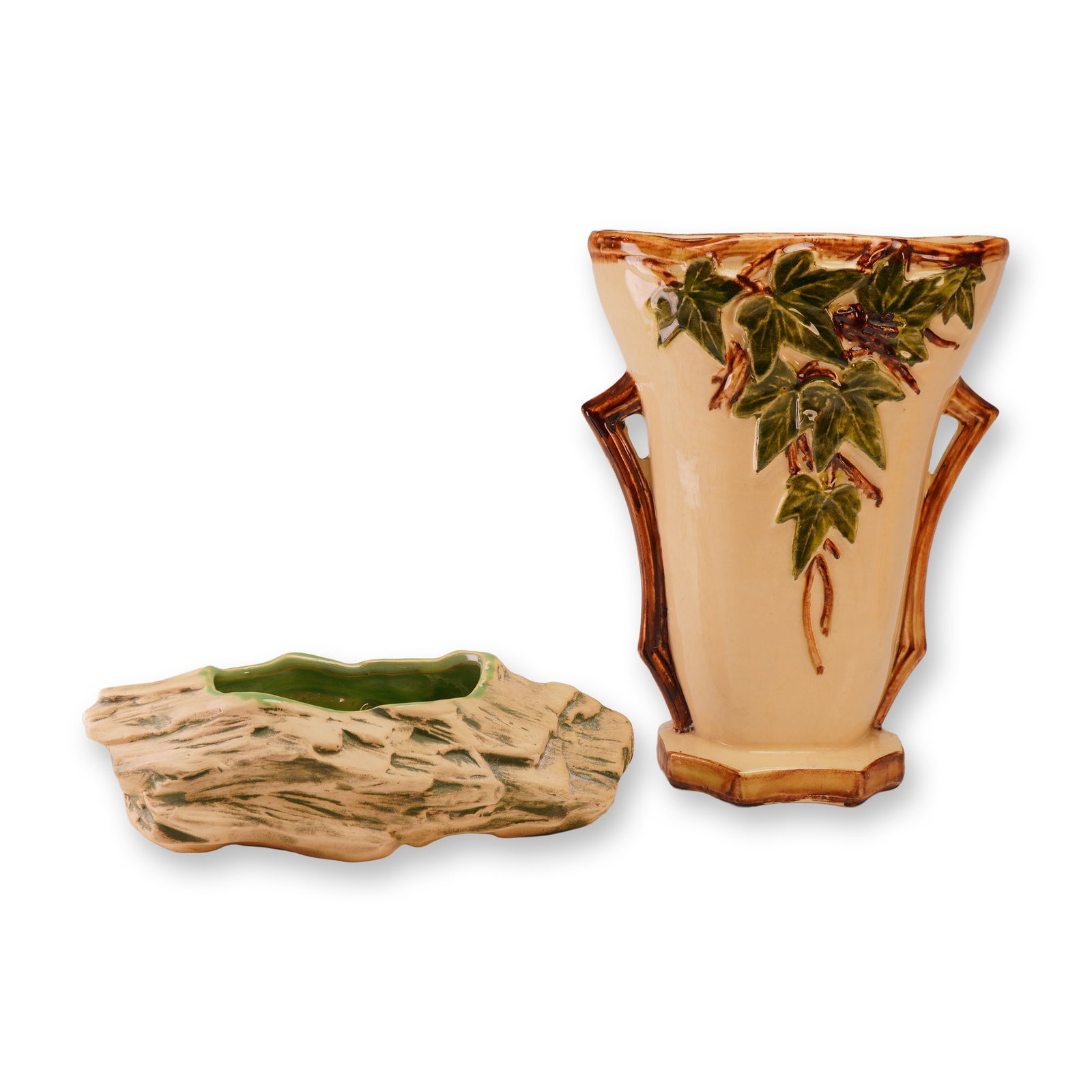 McCoy Art Pottery Ivy Pattern Double Handled Vase and Log Form Planter: A collection of two mid-20th century American art pottery pieces by McCoy, featuring the popular Ivy pattern. The lot includes a tall, double-handled vase and a horizontal log-form planter. The vase i