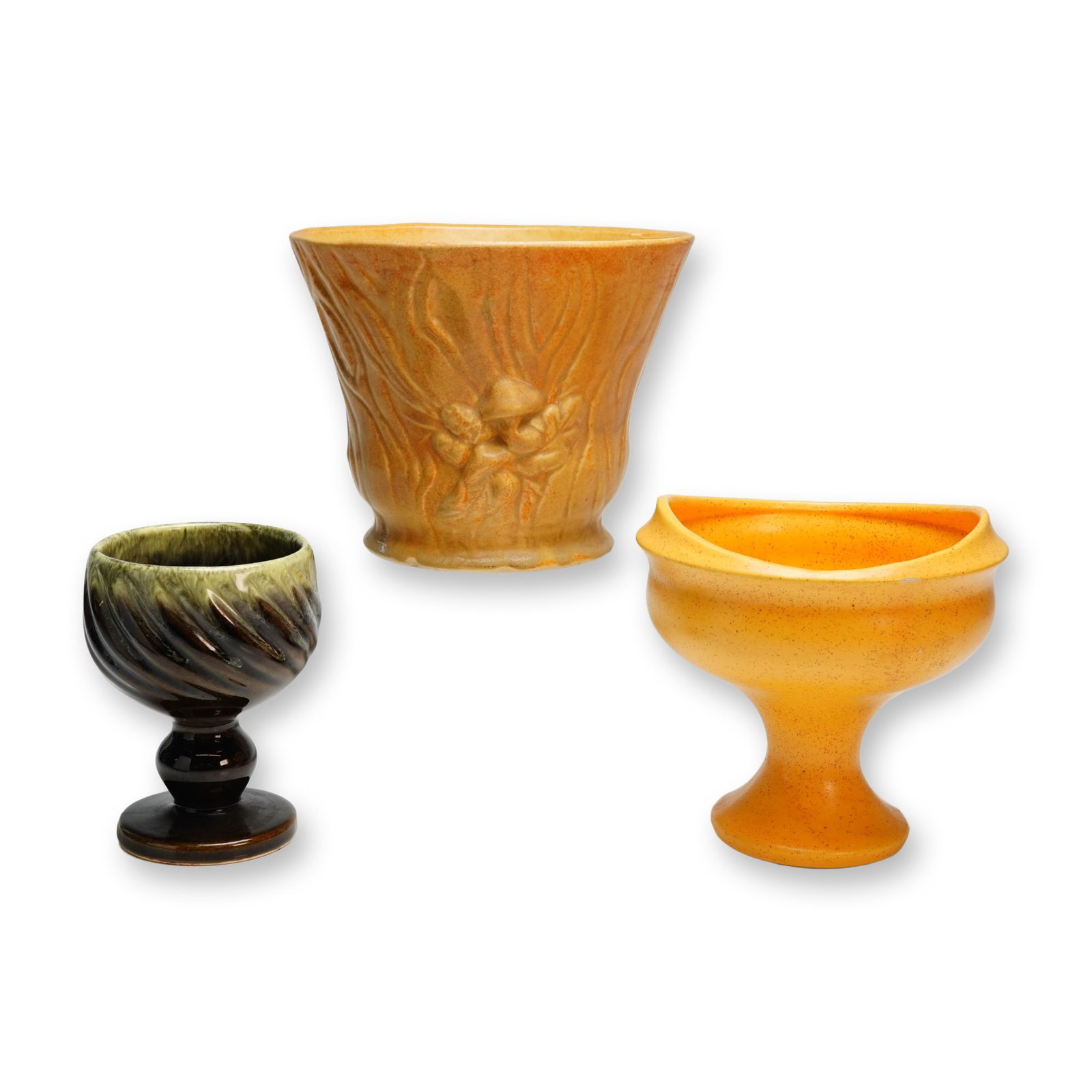 Three Brush-McCoy, Hull, and Floraline Pottery Cups and Planter: A group of three mid-20th-century American art pottery vessels comprising pieces by Brush-McCoy, Hull, and Floraline. The collection includes an ochre-colored planter with a relief-molded mushroom and