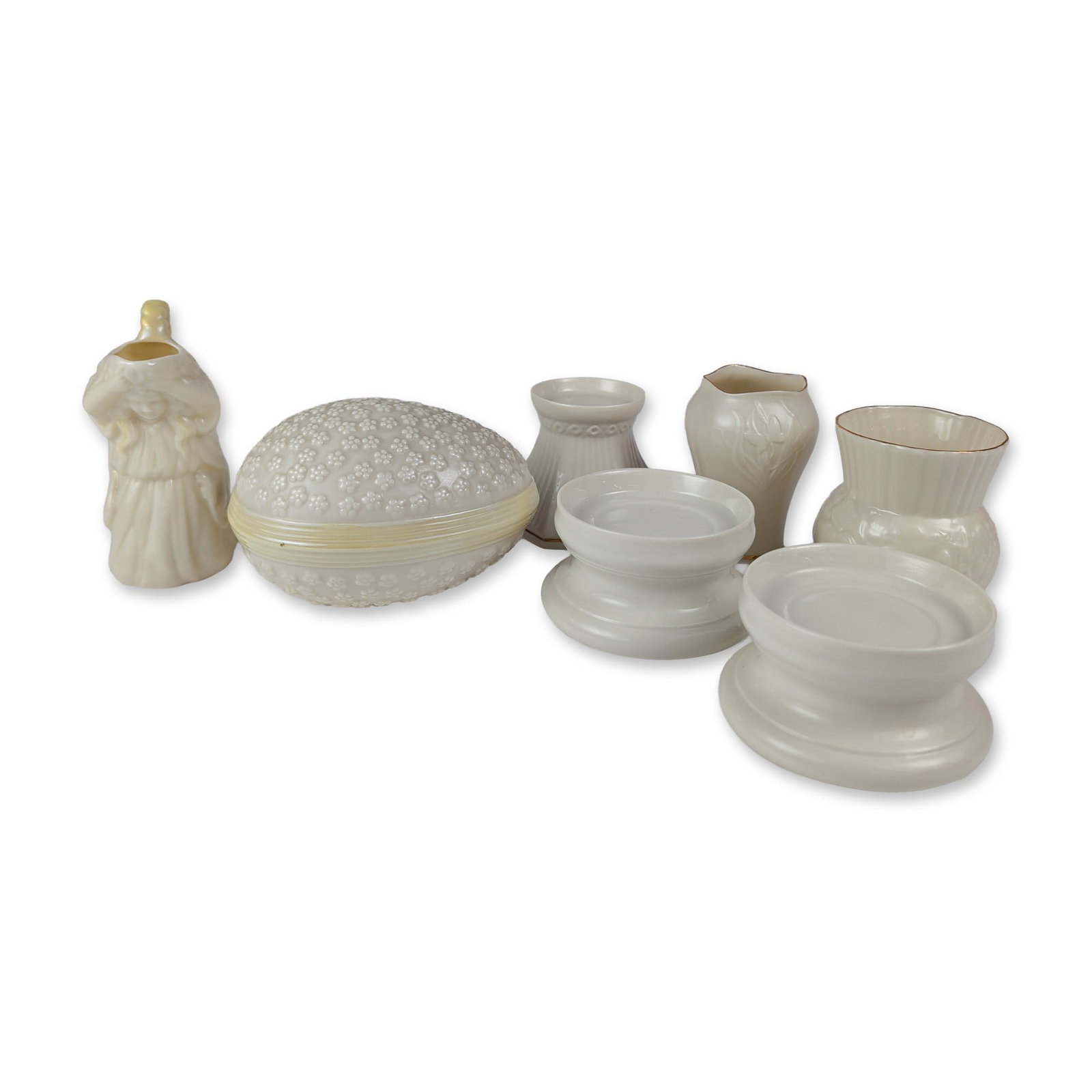 7pc Collection of Belleek Parian Porcelain Items: Collection of Belleek Irish parian porcelain including an egg-form figurine, two vases, a female form pitcher, and three candle stands. All pieces are finished in a characteristic iridescent luster gl