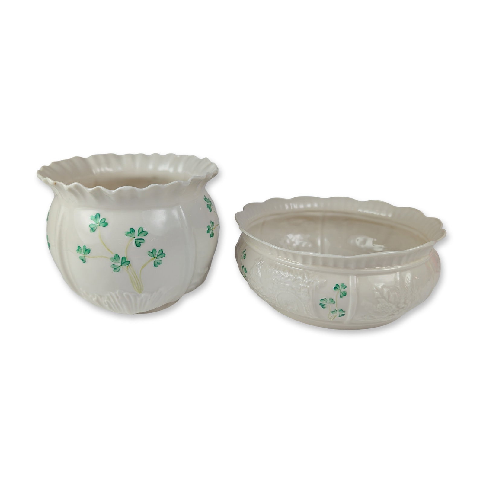 2pc Belleek Shamrock Porcelain Bowls: Belleek Pottery, Ireland parian porcelain bowls in the Shamrock pattern, featuring hand-painted green shamrocks over embossed basketweave and foliate textures. The forms are finished with a lustrous i