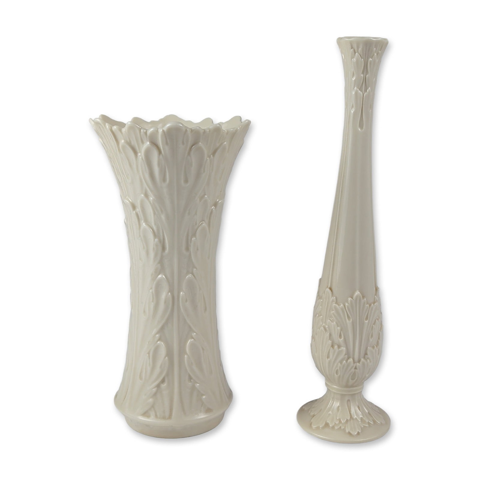 2pc Lenox Cream-colored Woodland & Florentine Porcelain Vases: Lenox, United States. Two vases in cream-colored porcelain featuring high-relief foliate motifs from the Woodland collection. The group includes one slender bud vase with a pedestal base and fluted ne