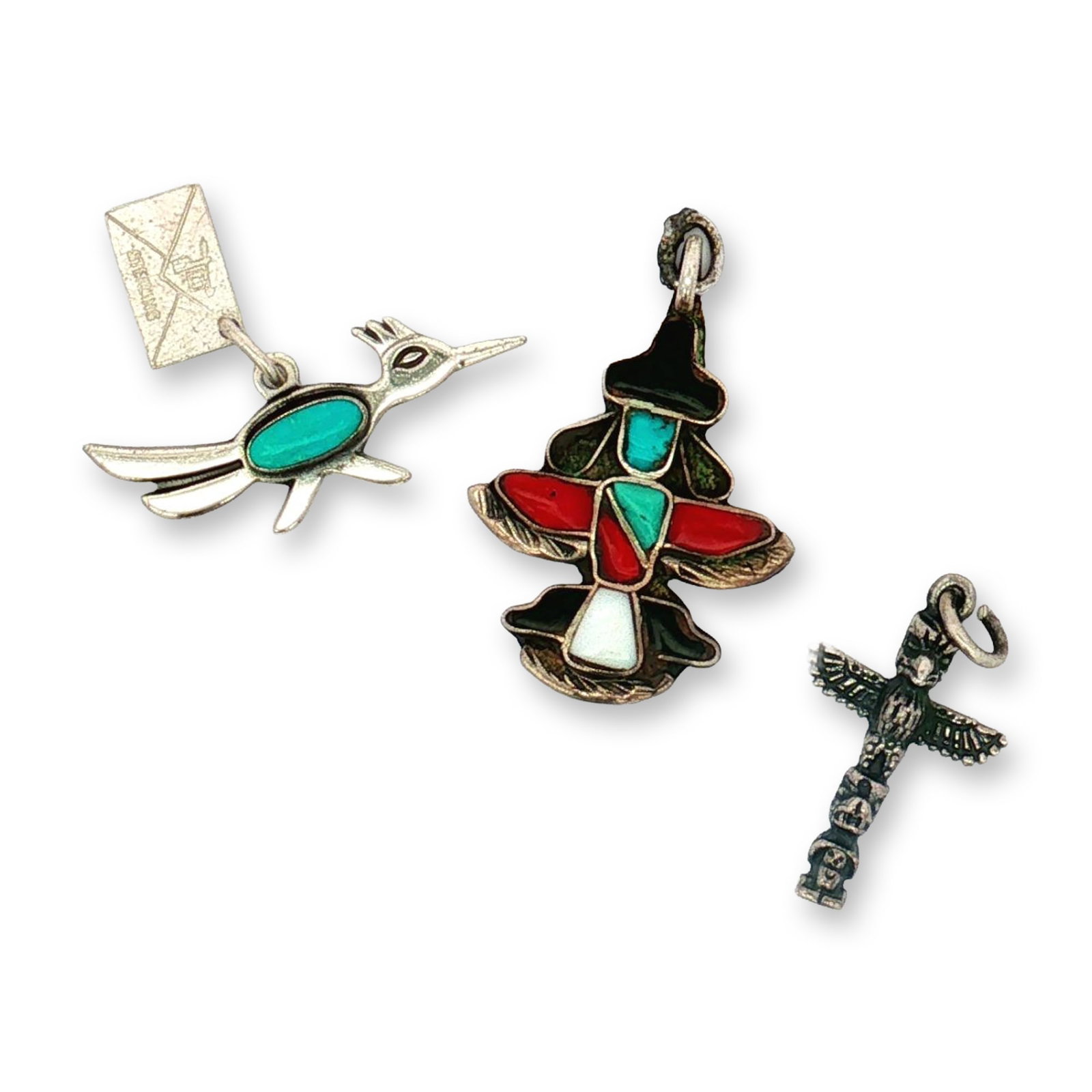 3pc Sterling Silver Southwestern and Native American-Inspired Charms: A collection of miniature sterling silver charms featuring Native American and Southwestern designs. Includes a Zuni knife-wing charm inlaid with turquoise, coral, onyx, and mother of pearl, a roadrun