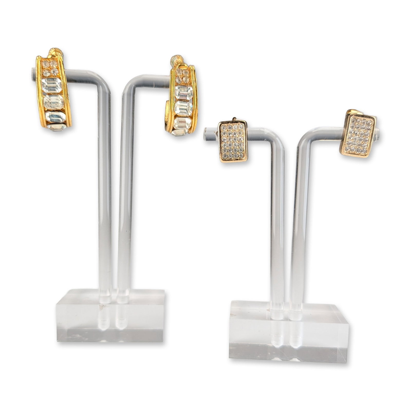 2 Pairs of Christian Dior and Vendome Costume Earrings: Two pairs of vintage gold-tone costume earrings. One pair by Christian Dior, rectangular clip-on style with pave-set clear round-cut rhinestones, marked copyright Ch.Dior to the reverse. The second pa