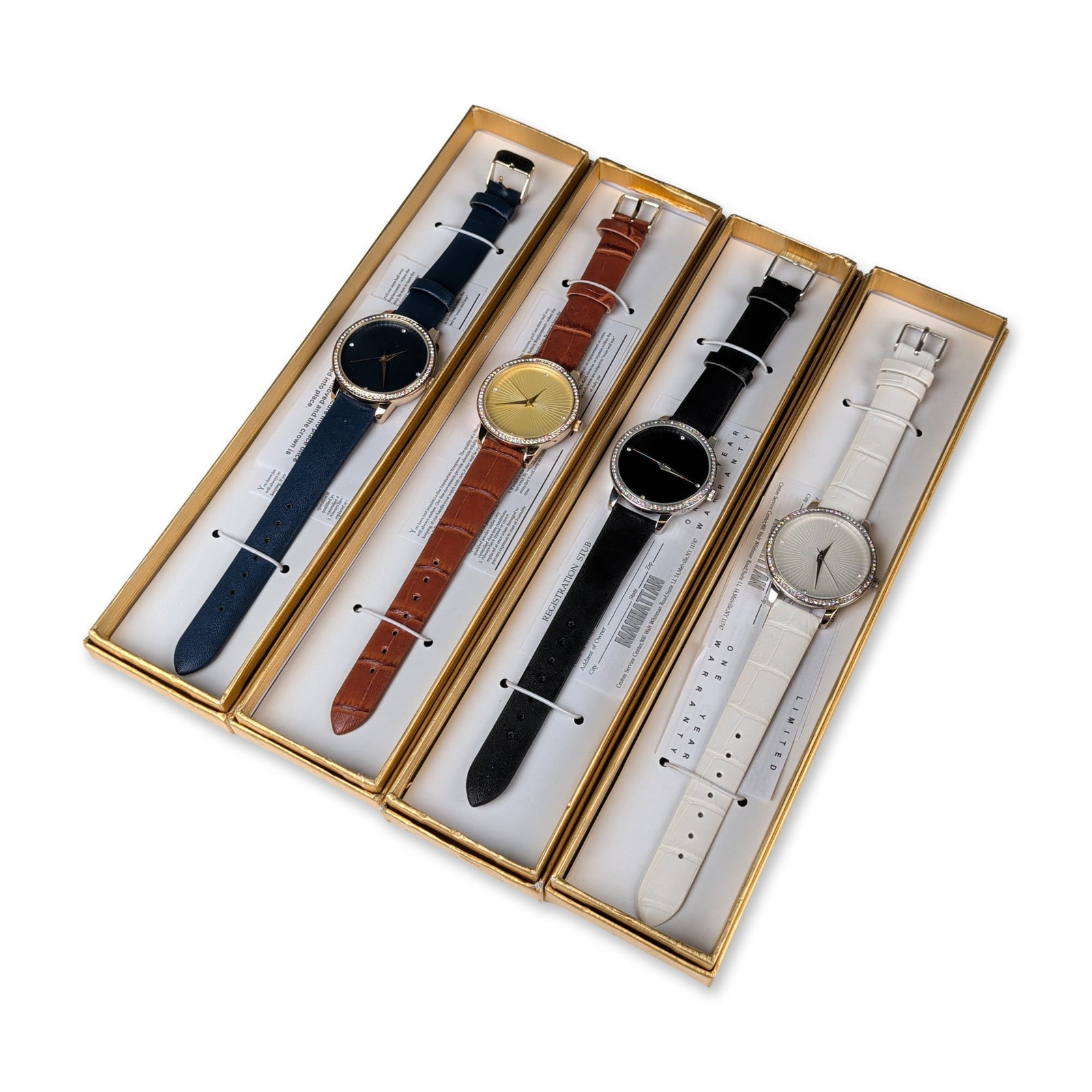 Group of Four Manhattan by Croton Watches: Manhattan by Croton. Group of four women's quartz dress watches, model CM404254, featuring base metal cases with crystal-set bezels and stainless steel backs. Each watch displays a sunburst dial with 
