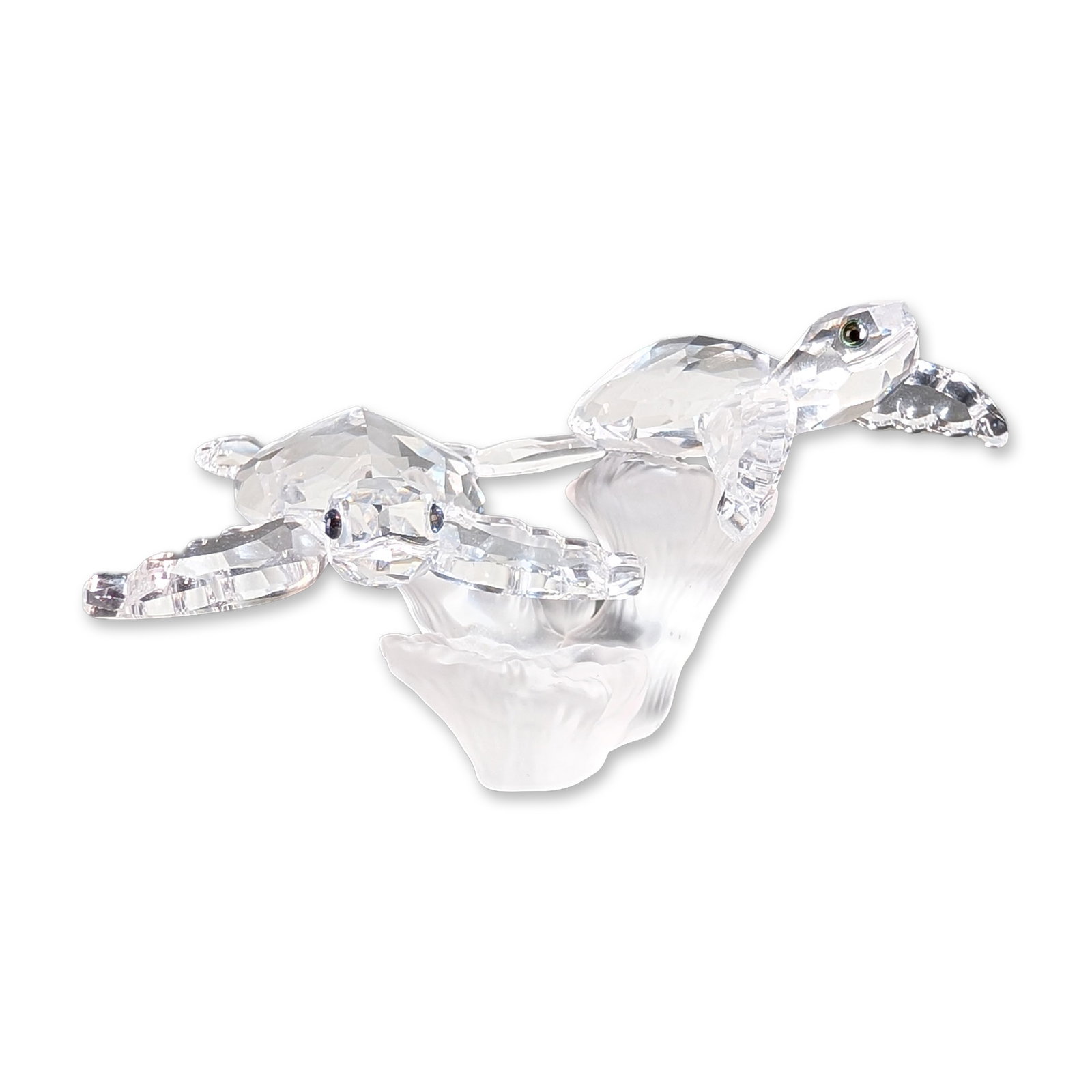 Swarovski Crystal Baby Sea Turtles Figurine: Swarovski figurine in faceted and frosted clear lead crystal, titled Baby Sea Turtles, featuring two turtles with dark bead eyes on a sculpted wave base. Includes original Swarovski branded blue prese