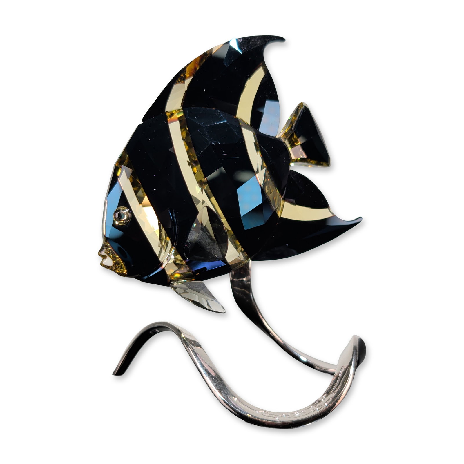 Swarovski Crystal French Angelfish Figurine: Swarovski Moroda French Angelfish figurine from the Paradise collection, executed in faceted lead crystal with a polished silver-tone metal base. The fish features a black crystal body with yellow ban