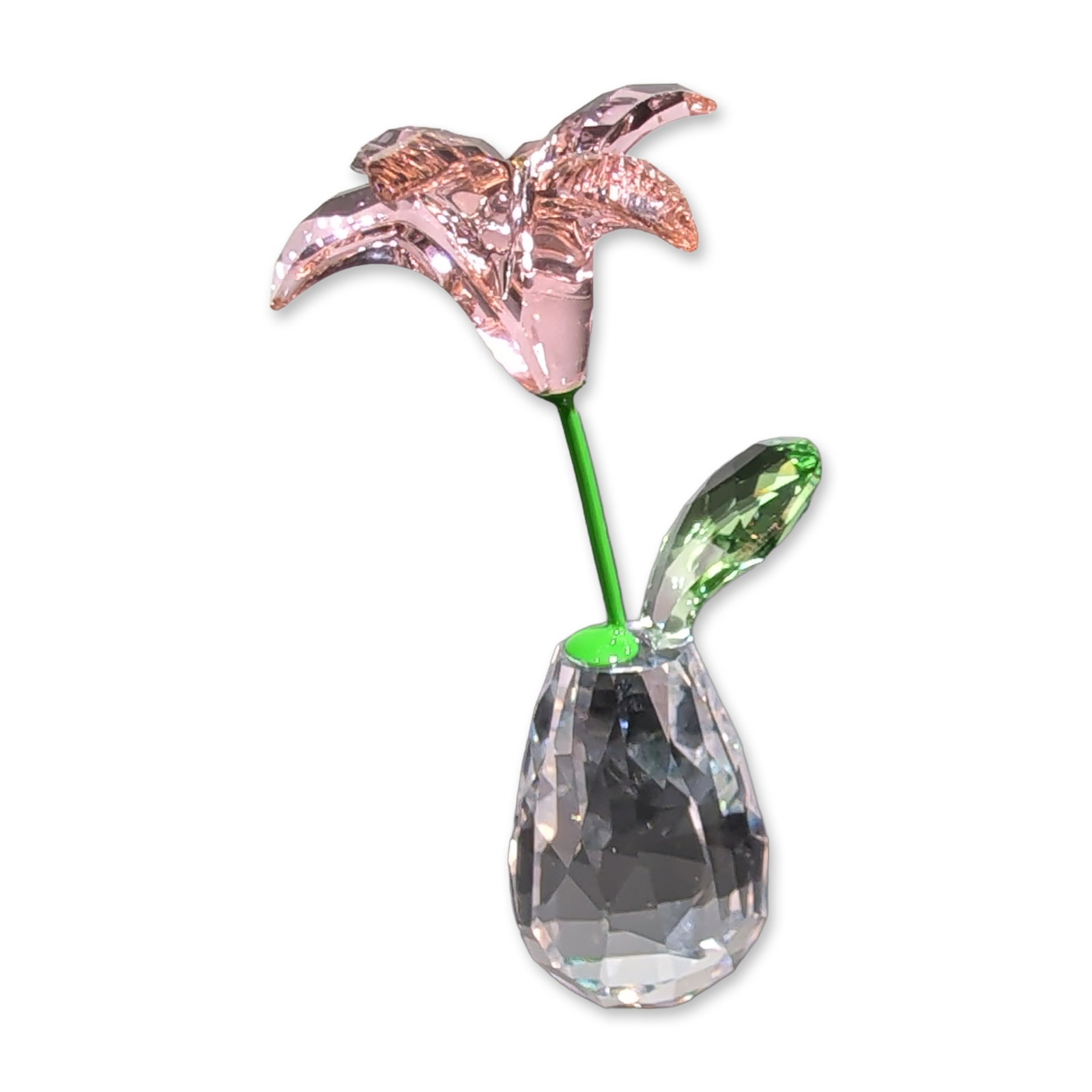 Swarovski Flower Dreams Pink Rose Figurine: Swarovski Flower Dreams series figurine in faceted crystal, depicting a pink rose. The piece features a multi-petaled pink crystal blossom on a green crystal stem with a single leaf, set within a clea
