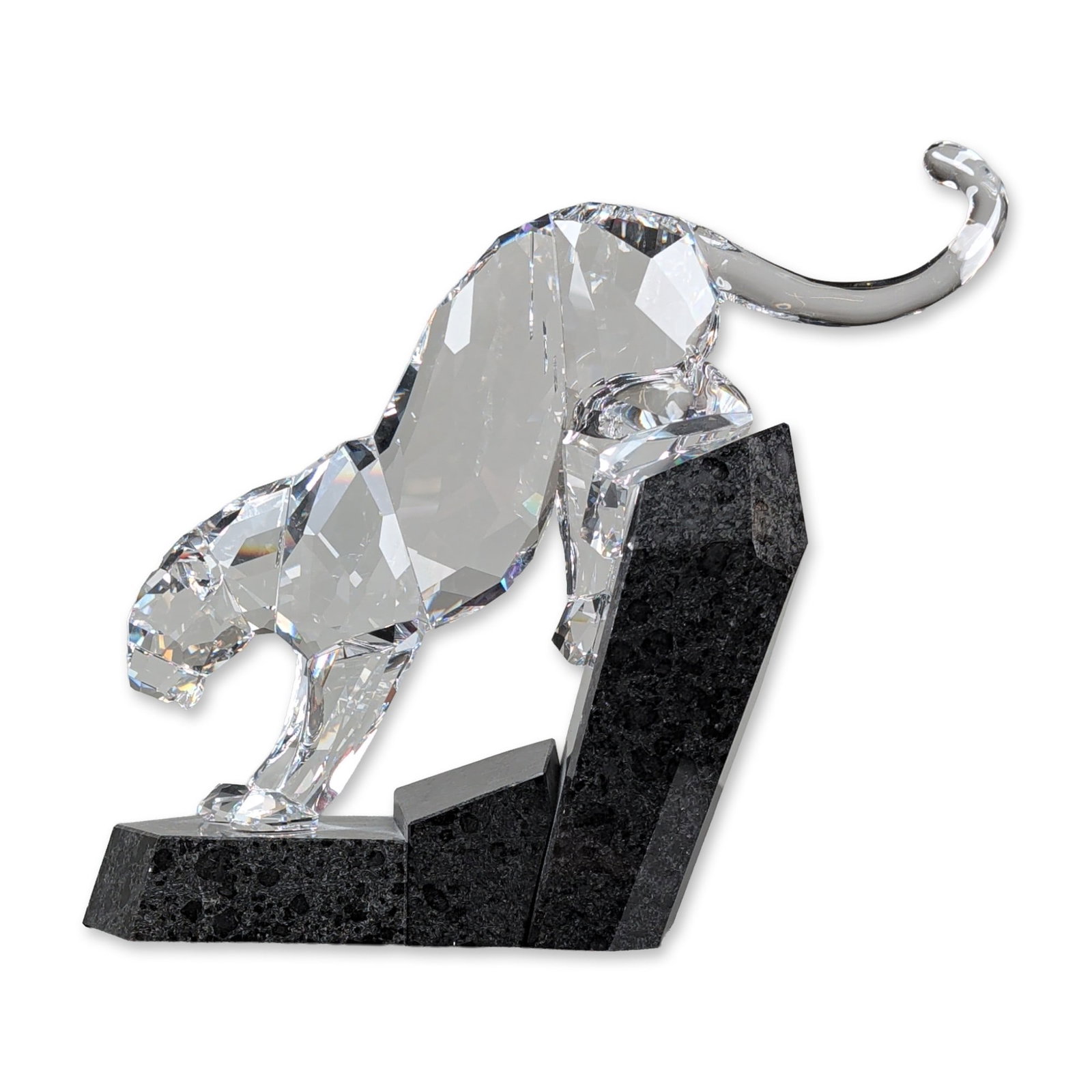 Swarovski Crystal Soulmate Figurine, Panther: Swarovski. Soulmate Collection Panther figurine in clear faceted lead crystal and black granite, featuring a dynamic climbing pose across two geometric blocks. The piece features a multi-faceted body 
