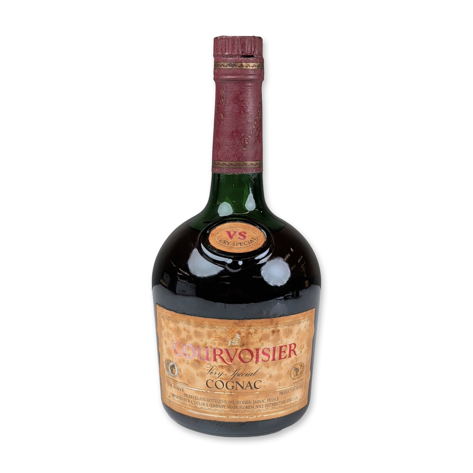 Courvoisier Very Special Cognac 750ml Bottle: Courvoisier (Jarnac, France). VS Very Special Cognac in a dark green glass bottle, 80 proof. Features a parchment-style main label with red and black text, a circular VS neck label, and a back label f