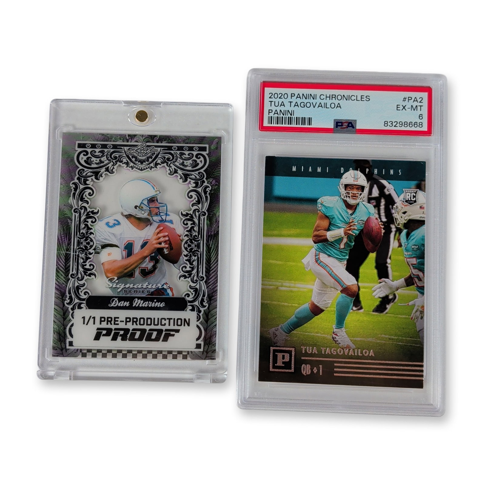 2pc Miami Dolphins Quarterback Trading Cards: Two professional football trading cards featuring Miami Dolphins quarterbacks Dan Marino and Tua Tagovailoa. Included is a 2020 Panini Chronicles Tua Tagovailoa rookie card, number PA-2,