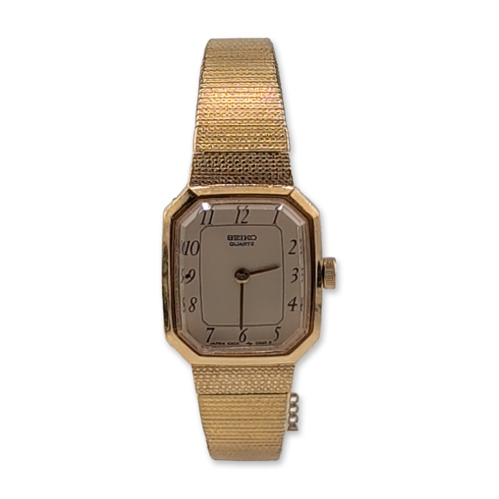 Seiko Ladies Gold Plated Quartz Dress Watch: This watch has an octagonal gold-tone base metal case with a stainless steel back and a champagne-colored dial. The dial features black Arabic numeral hour markers and baton hands framed by a printed