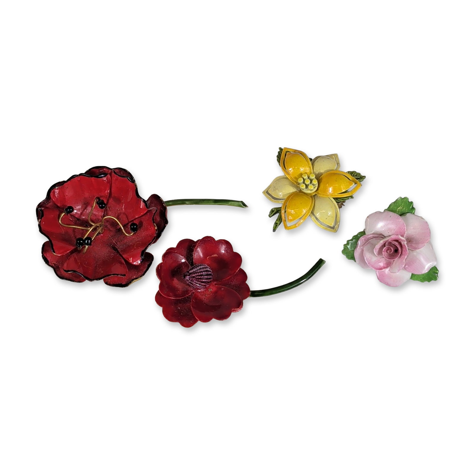 4pc Vintage Floral Enameled and Porcelain Brooches: Assortment of vintage floral brooches featuring enameled metal and porcelain designs, including pieces by Original by Robert and Royal Adderley. The collection includes a Royal Adderley pink porcelain