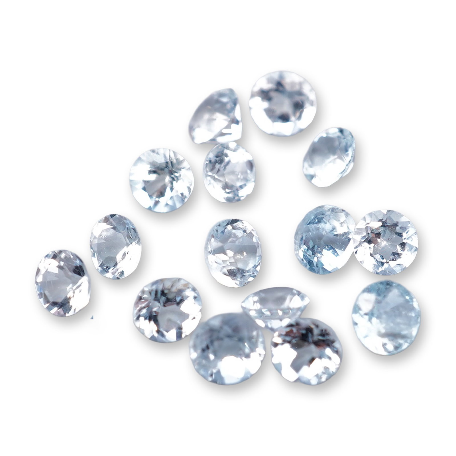 Seventeen Round Faceted Aquamarine Gemstones: Assortment of seventeen loose gemstones in aquamarine, round faceted with brilliant-style faceting. The stones feature a pale, watery light blue color and appear to have good clarity. 1.1ct Dimensions