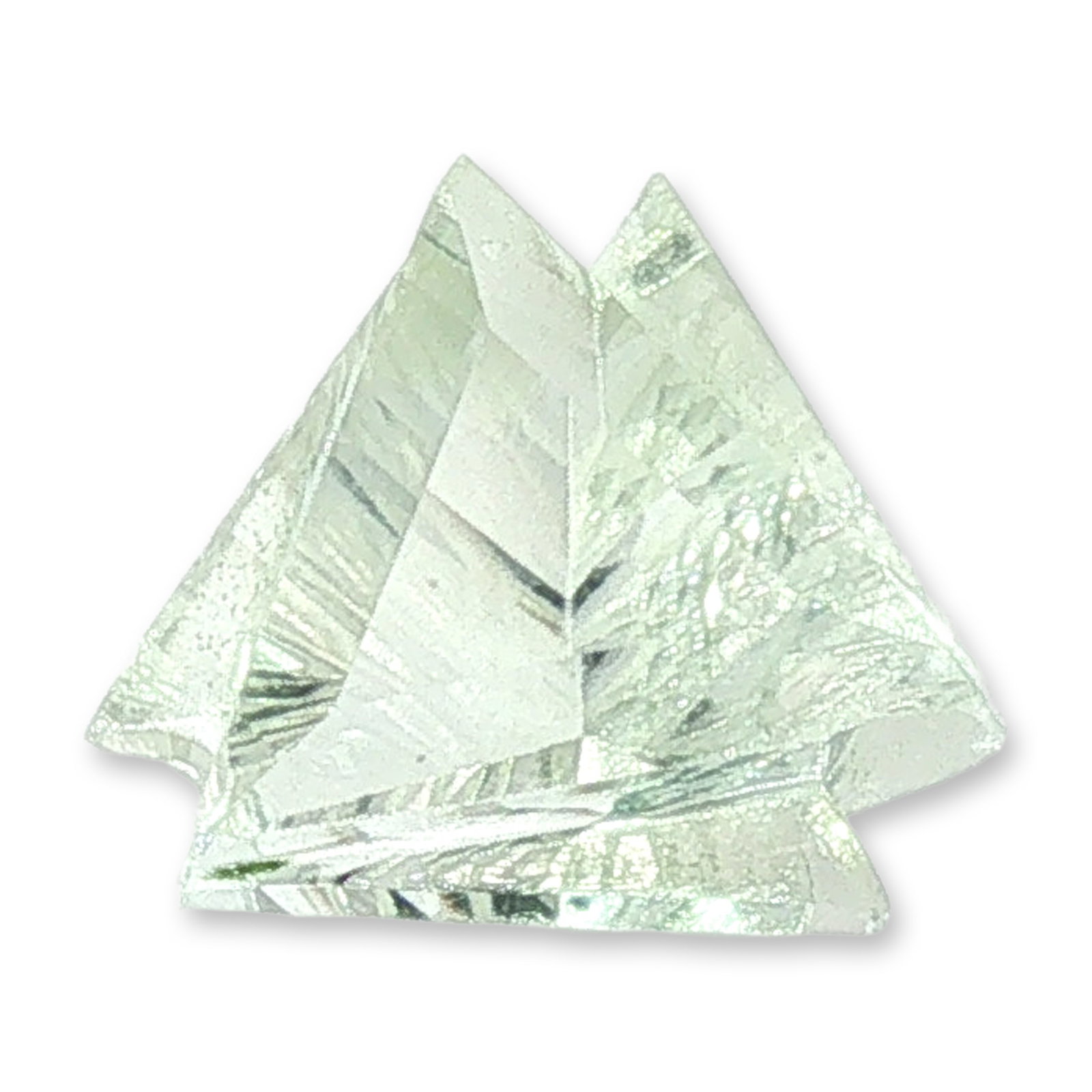 3.0 Carat Geometric Cut Prasiolite Quartz Gemstone: Custom-cut loose gemstone featuring an intricate fantasy carving with a dual-peaked geometric profile. The stone exhibits a very pale mint green to light greenish-gray hue with subtle greenish underto