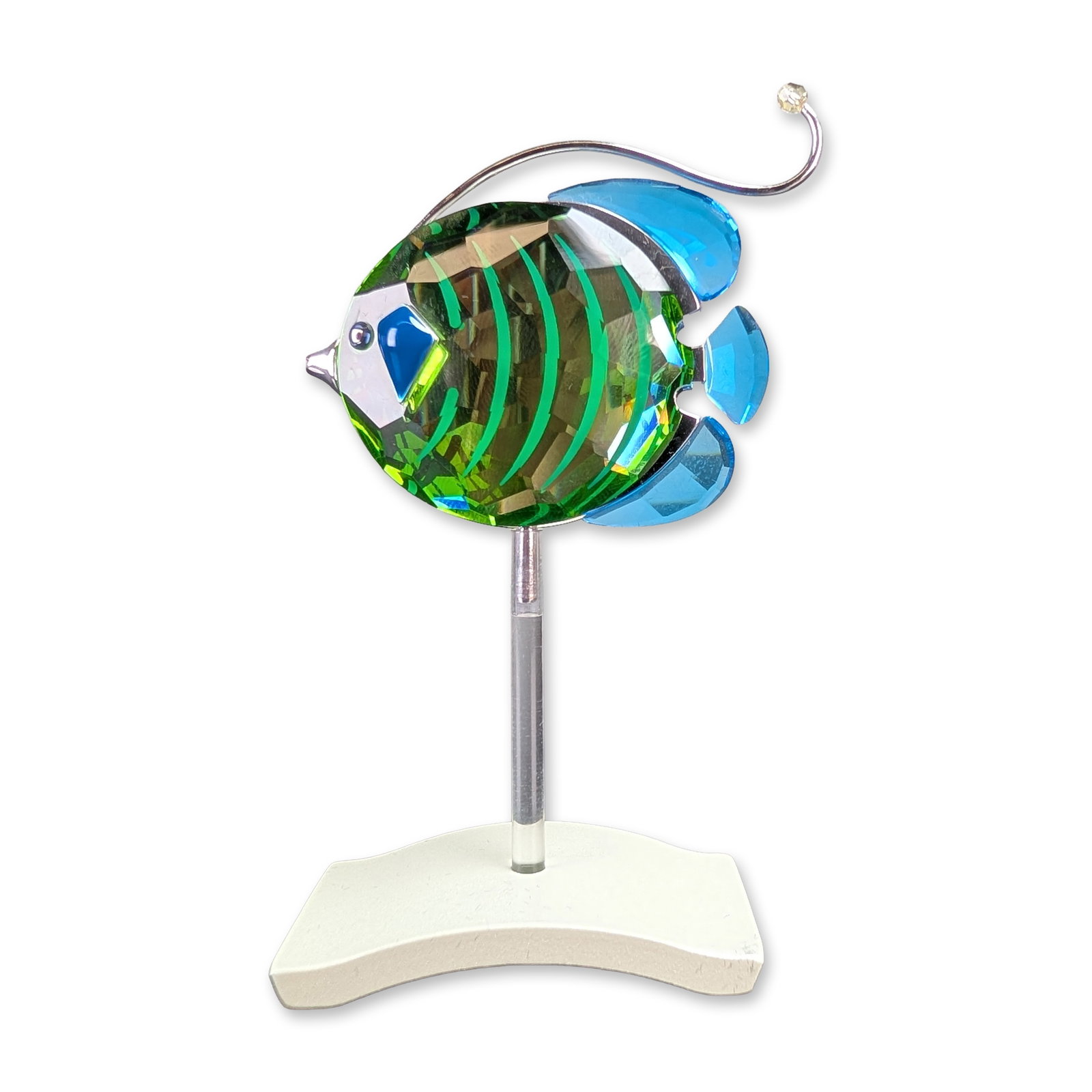 Swarovski Chira Peridot Crystal Fish Figurine: Swarovski Chira Peridot tropical fish figurine in faceted lead crystal, featuring a green body with dark vertical stripes and blue fins. The piece includes a silver-tone metal wire filament tipped wit