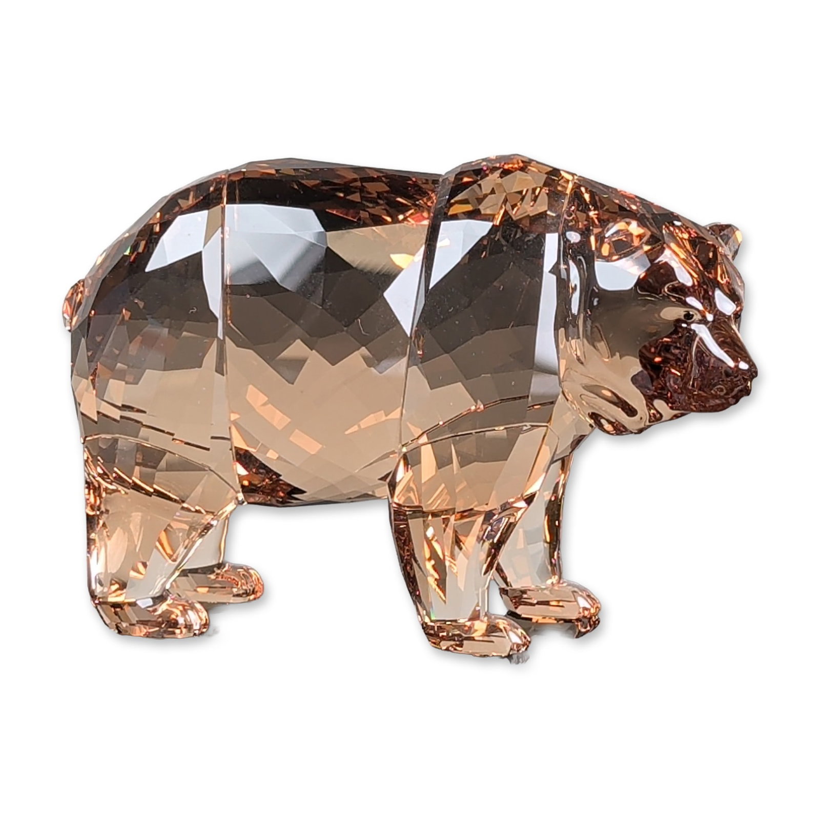 Swarovski SCS 2017 Annual Edition Crystal Figurine, Arcadia Bear: The walking bear form is rendered in faceted Sunray crystal. The base of one foot features the etched Swarovski swan logo, the copyright year 2017, and the name Arcadia. Includes original branded SCS 