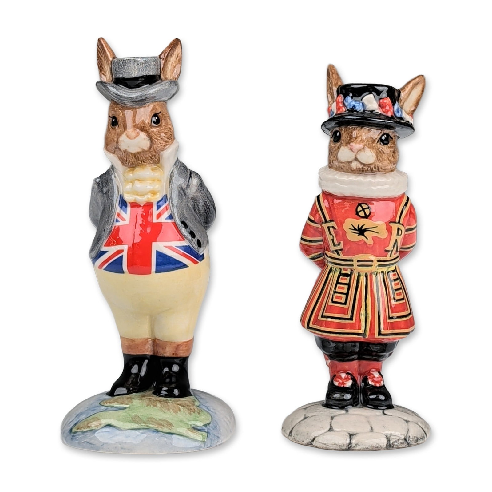 2pc Royal Doulton Bunnykins Figurines: Royal Doulton. Two limited edition Bunnykins ceramic figurines produced for U.K.I. Ceramics Ltd. The lot includes Beefeater Bunnykins (DB 163) from a special edition of 1,500, dated 1995, and John Bul