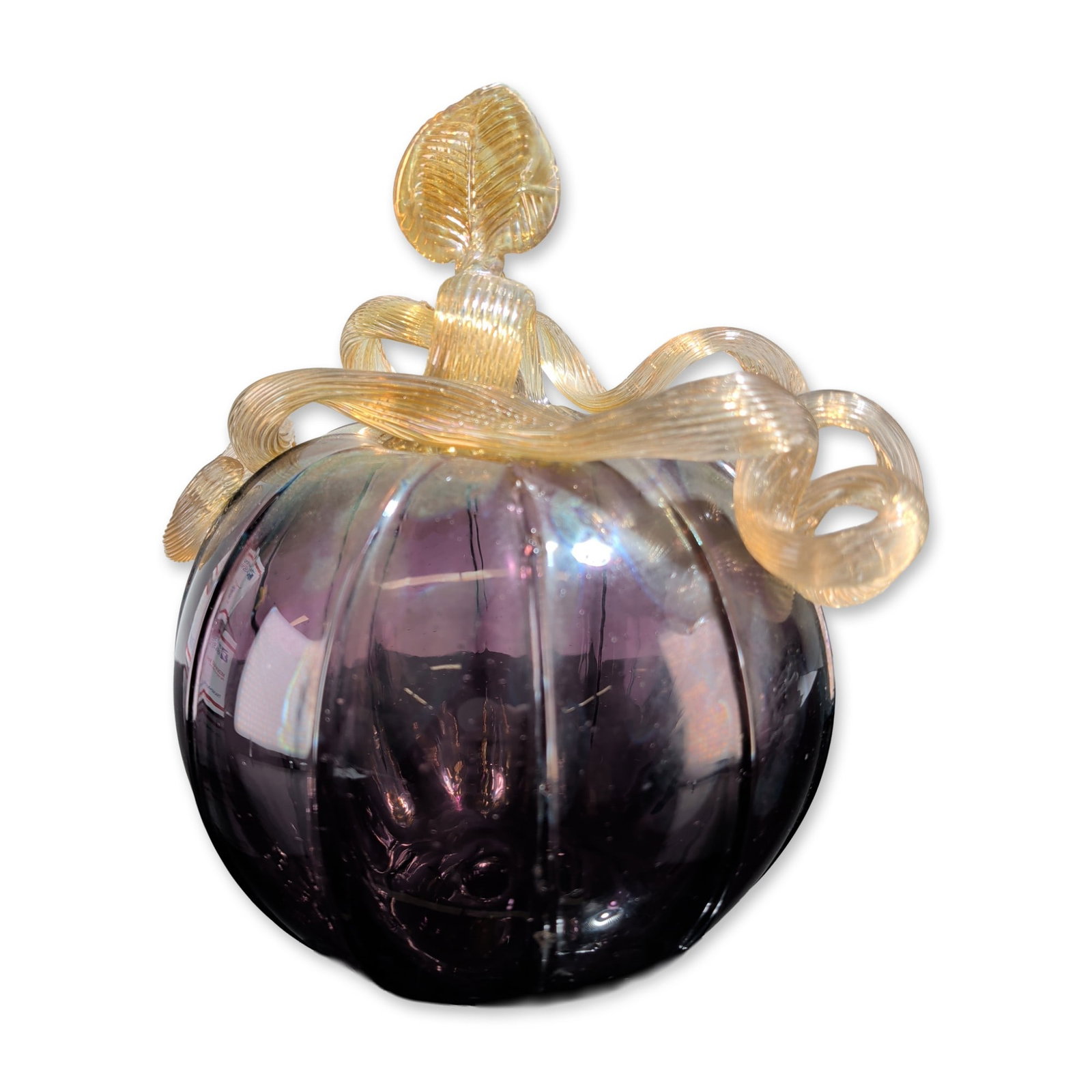 Steven Lundberg (American 1953-2008) Amethyst Art Glass Pumpkin: Steven Lundberg Glass Art hand-blown pumpkin sculpture in iridescent amethyst purple glass, dated 2002. The piece features a globular multi-lobed body topped with a textured, multi-coiled amber-gold s