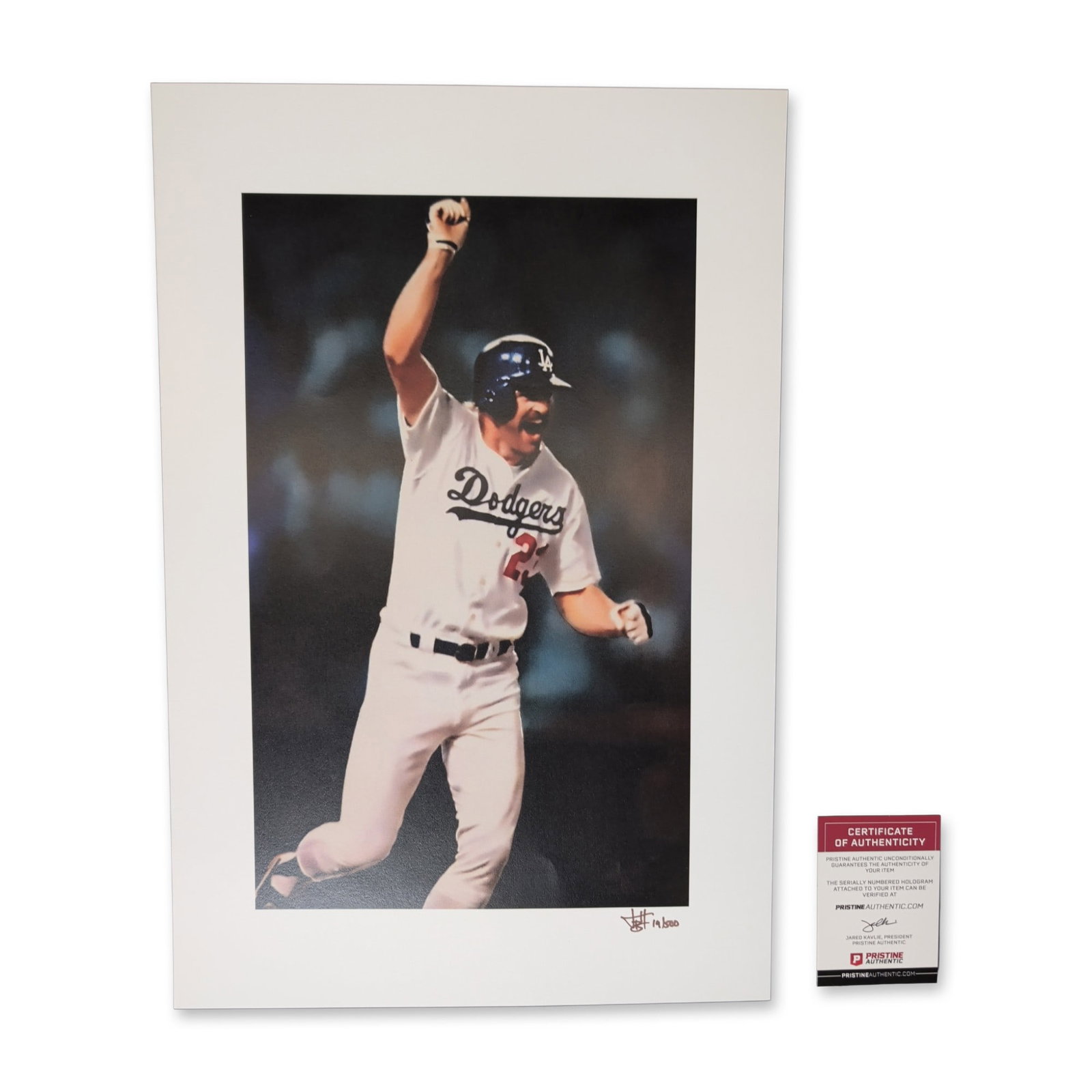 Joshua Barton Signed Kirk Gibson Dodgers World Series Photograph: Color photograph featuring Kirk Gibson in his 1988 World Series home run celebration for the Los Angeles Dodgers. Hand-signed by Kirk Gibson in brown ink within the lower-right margin. Limited edition