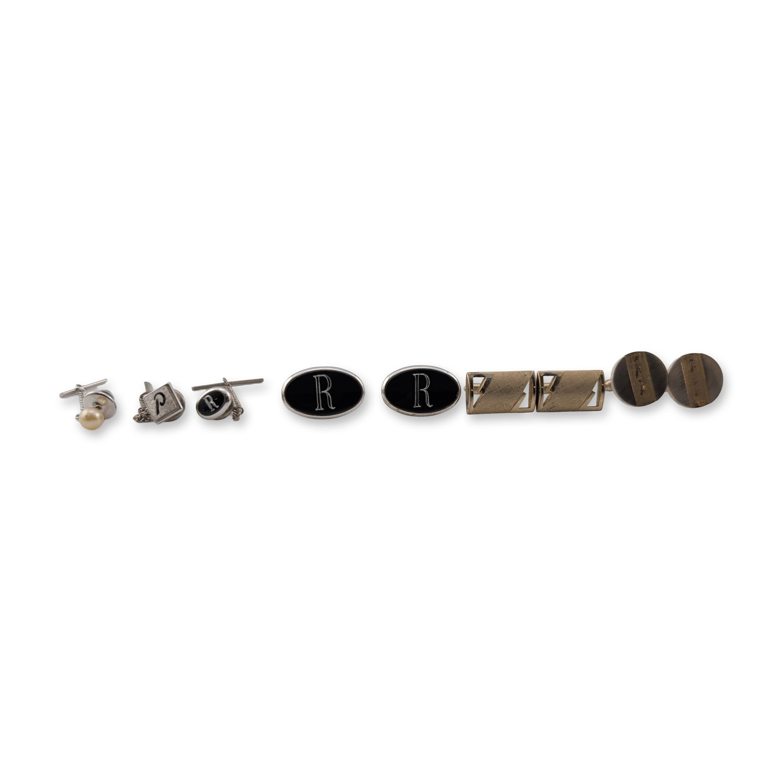 Collection of Men's Cufflinks (3 pair) and Tie Pins (3): Collection of six men's jewelry accessories comprising three pairs of cufflinks and three tie tacks in gold-tone and silver-tone plated base metals. The group features one pair of silver-tone oval cuf
