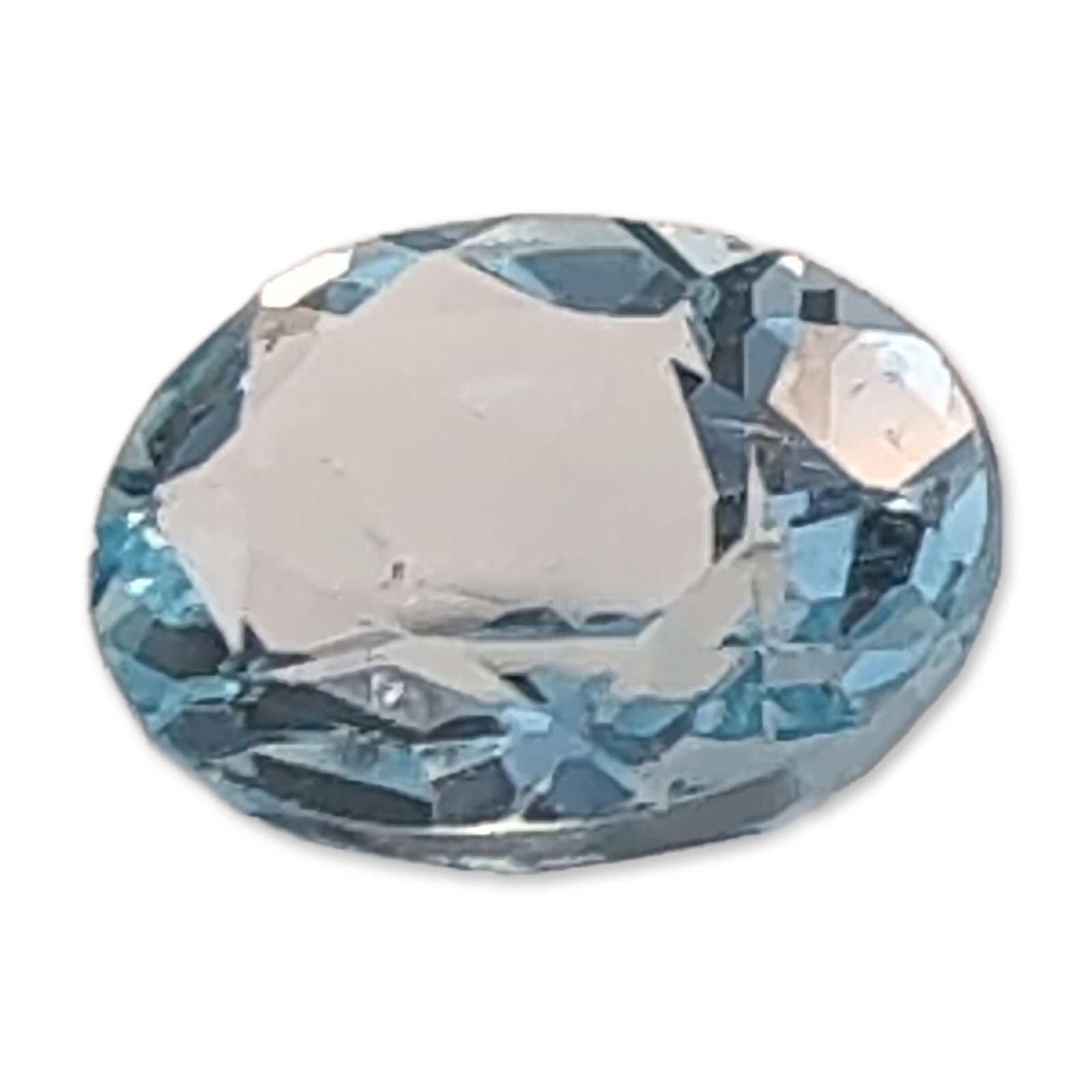 Oval Cut Sky Blue Loose Topaz Gemstone: Oval brilliant cut. Loose faceted Topaz gemstone in sky blue. Features eye-clean clarity and high transparency. Accompanied by handwritten specification tag. Length: 9.0 mm Weight: 2.2 carats. Dimensi