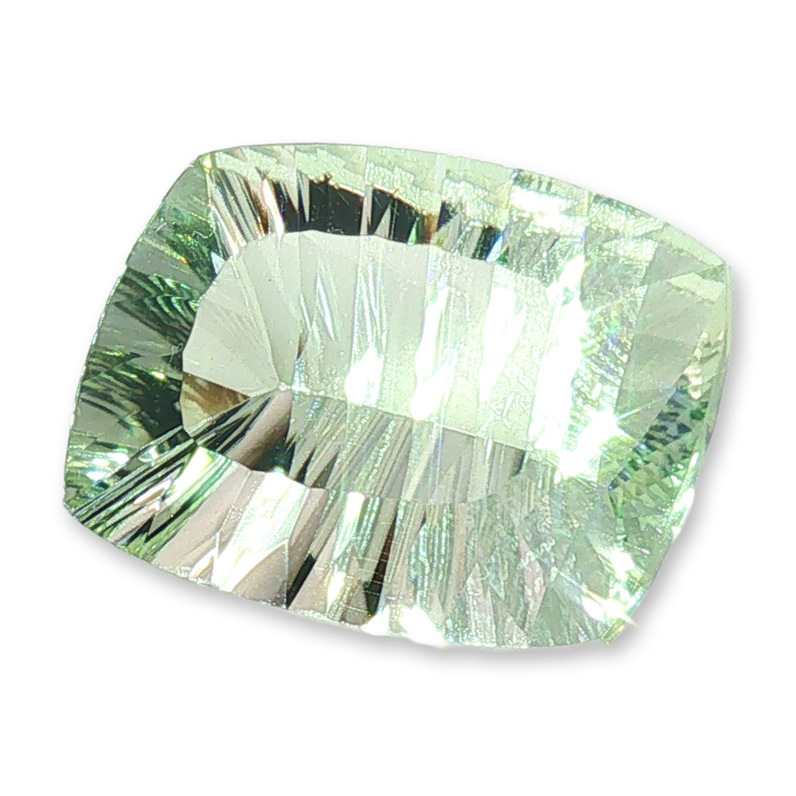 Concave Cut Pale Green Quartz Loose Gemstone: A single loose gemstone identified as pale green quartz. The stone features a soft rectangular cushion shape and is worked with a distinctive concave cut on the pavilion, designed to create dynamic,
