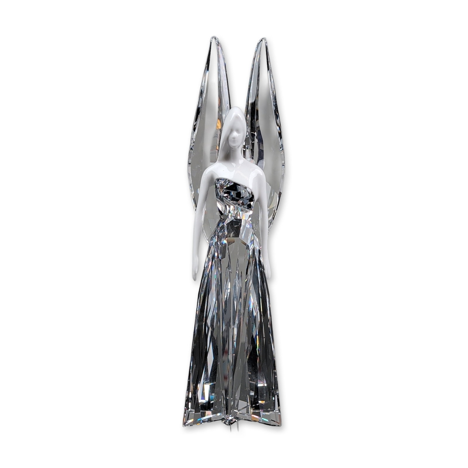 Swarovski Crystal Figurine, Angel Adrienne: Swarovski Angel Adrienne figurine designed by Heinz Tabertshofer in faceted clear and matte white lead crystal. The stylized modern figure features elongated sweeping wings and a tapering base in