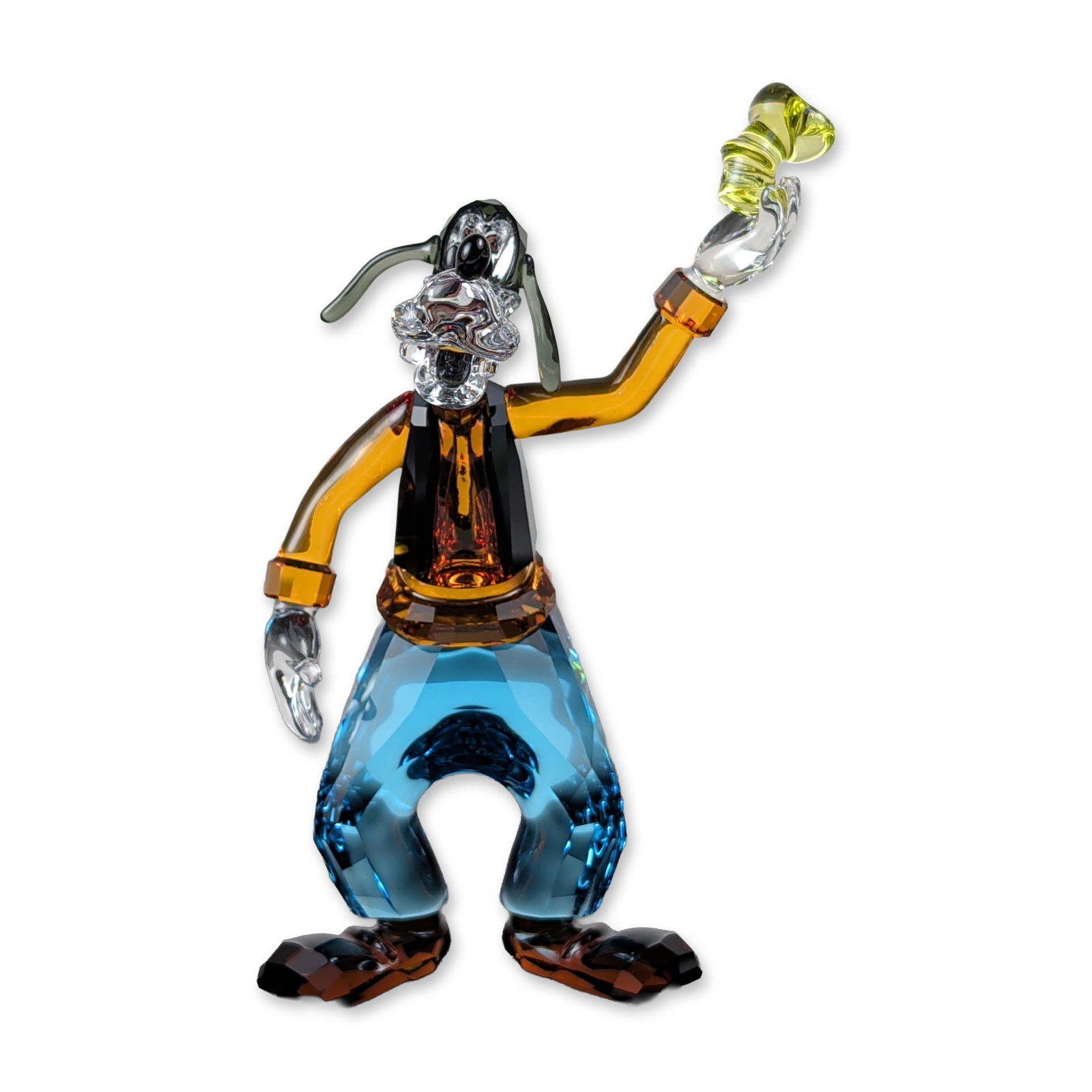 Swarovski Disney Goofy Crystal Figurine: Swarovski. Disney collection figurine in multi-colored faceted lead crystal, model 5301576, depicting the character Goofy. The figure features an orange torso, black vest, blue pants, and brown shoes,