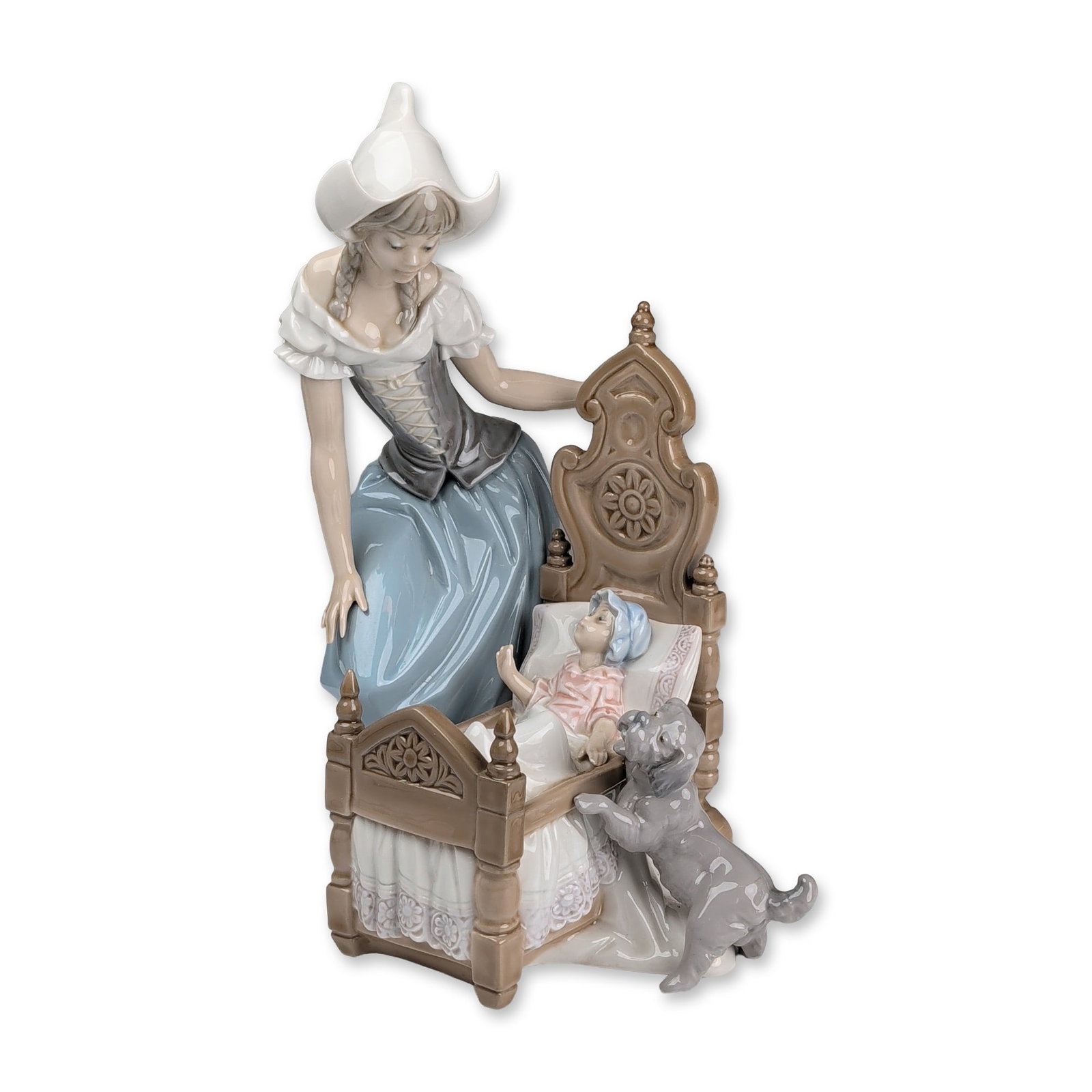 Lladro Porcelain Figurine, Dutch Mother 01005083: A Dutch Cradle figurine in glazed porcelain sculpted by Salvador Debon. The scene depicts a young woman in traditional Dutch attire with a winged bonnet and braided hair, leaning over a detailed