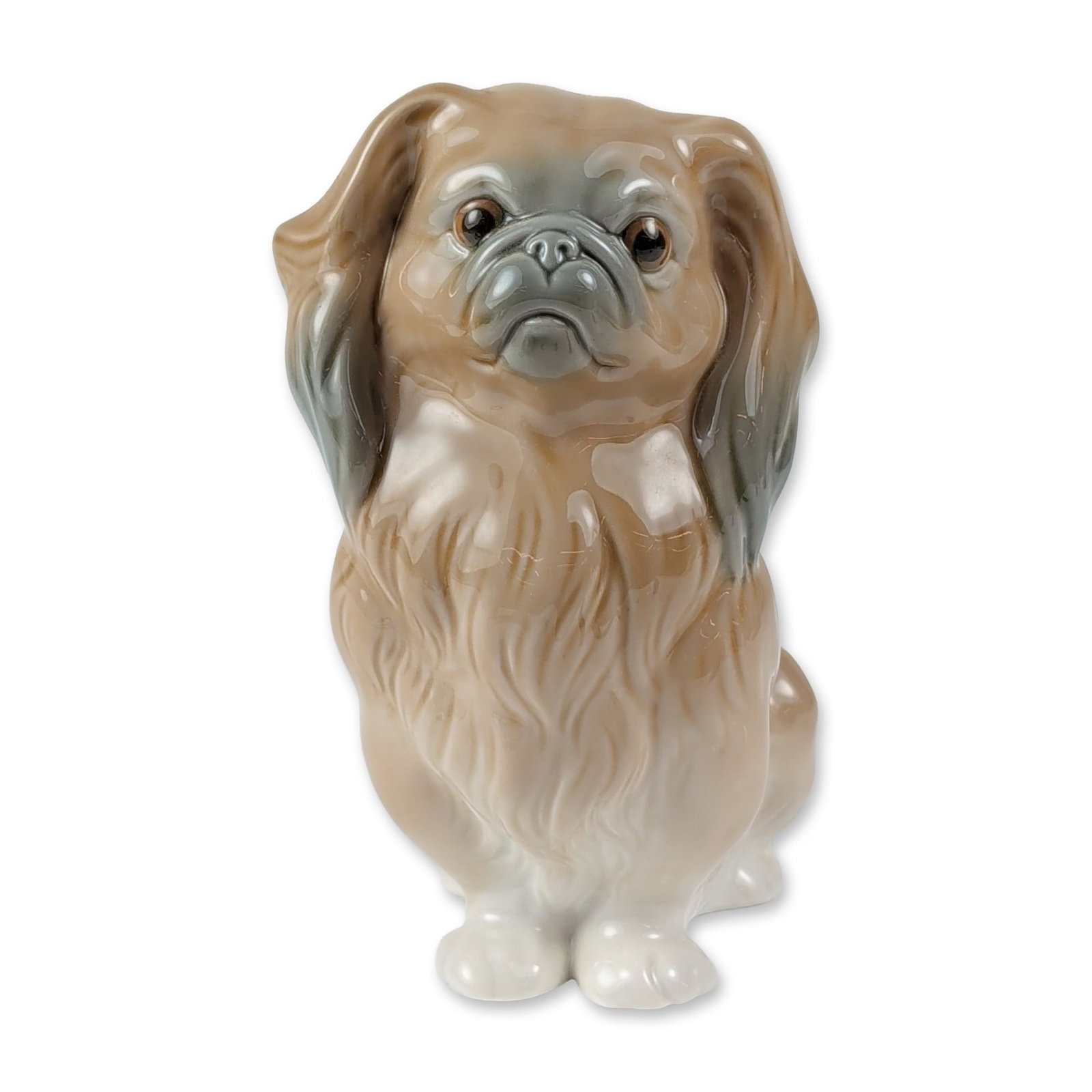 Lladro Spanish Porcelain Pekingese Figurine 1004641: Lladro glazed porcelain figurine, model number 1004641, titled Pekingese Dog, sculpted by Salvador Furio. The figure is rendered in a naturalistic color palette of tan and buff tones with grey-blue