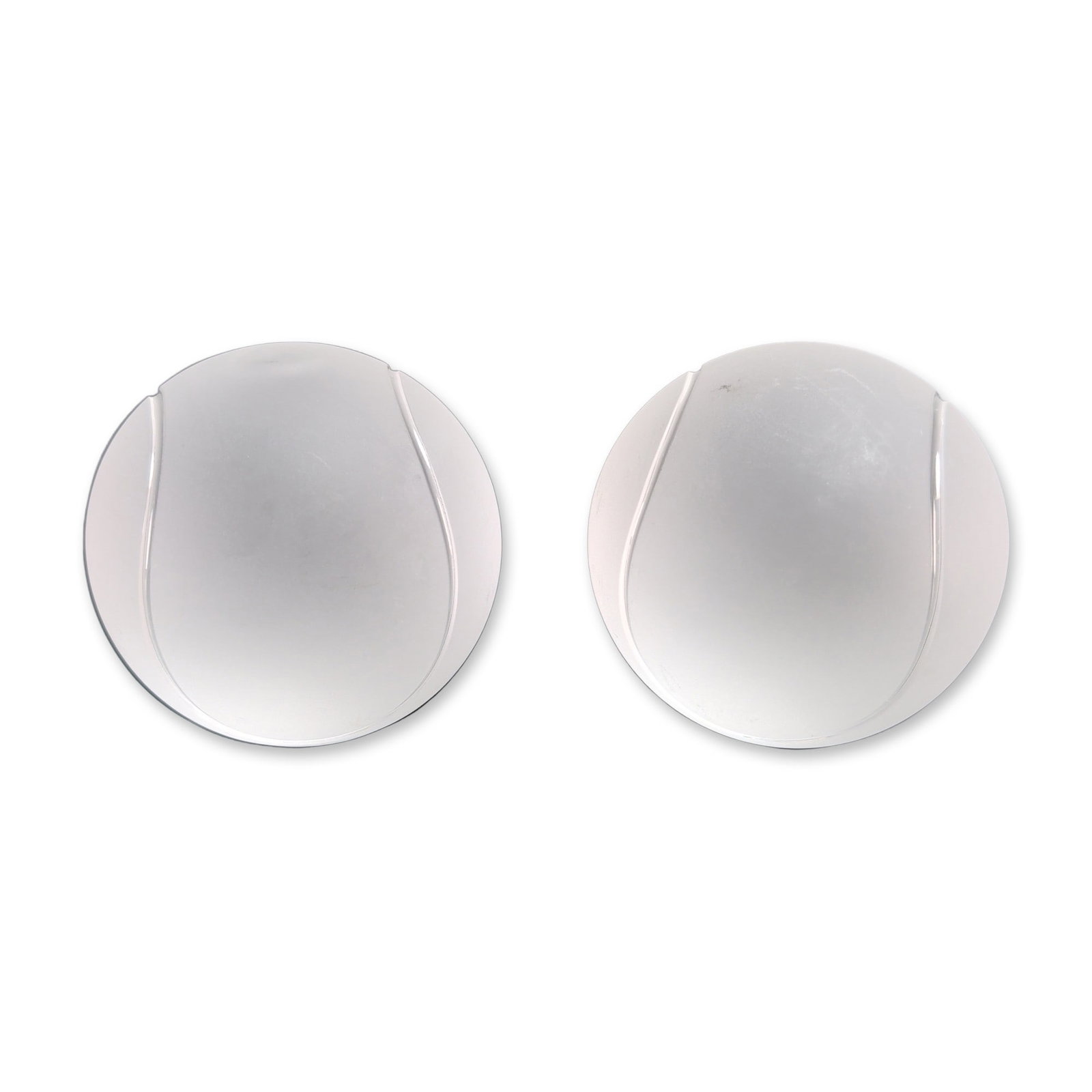 2pc Sasaki Japanese Frosted Lead Crystal Tennis Balls: Sasaki, Japan, pair of decorative objects in frosted lead crystal, shaped as tennis balls with clear incised curvilinear seams. Each piece is finished with a circular, flat-ground and polished base.