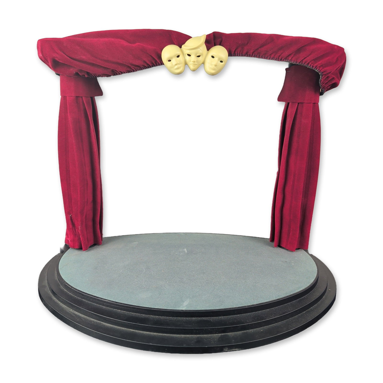 Swarovski Masquerade Trilogy Theatrical Display Stage: Swarovski theatrical display stage in black plastic and red velvet-style fabric, designed for the Masquerade trilogy series. The semi-circular base features a light gray fabric-covered stage floor fra