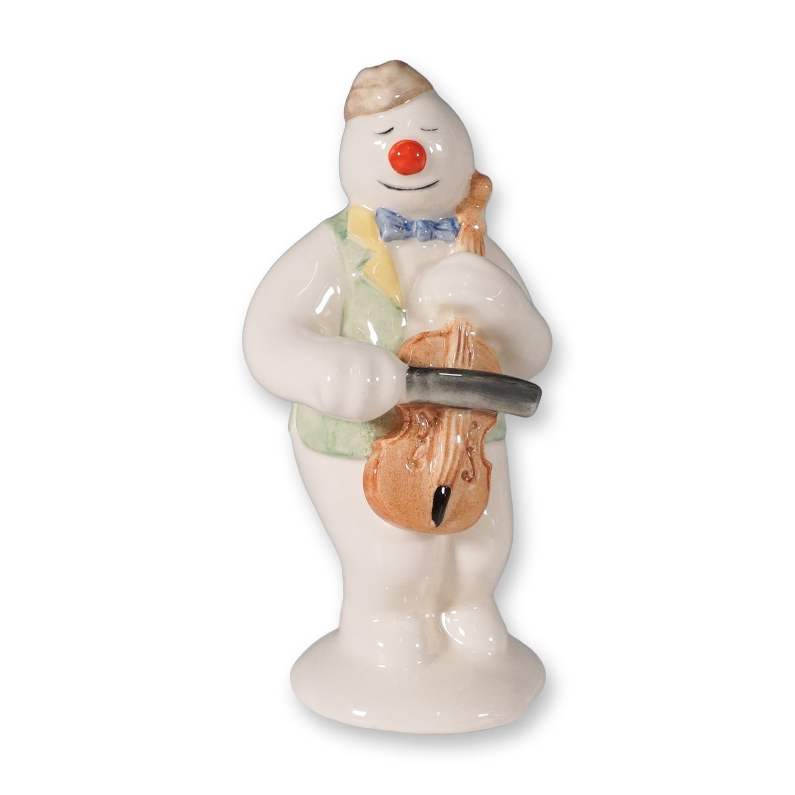 Royal Doulton The Snowman Figurine, Cellist Snowman DS17: This Royal Doulton figurine, part of The Snowman Gift Collection, features the charming Cellist Snowman, model number DS17. Sculpted in fine porcelain, the figurine stands at 5.25"H and showcases the 