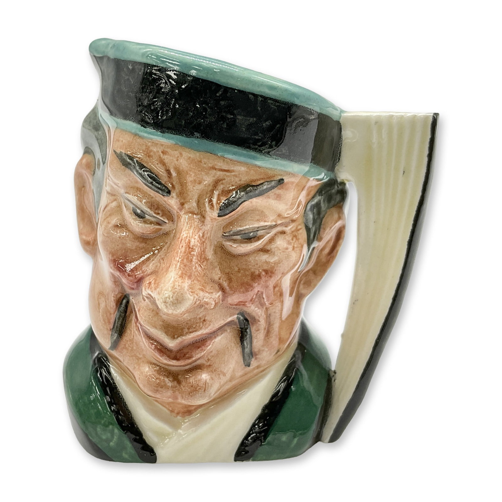 Mikado D6525 - Mini - Royal Doulton Character Jug: Style One, fan handle. Black and turquoise hat; green and white robes. Royal Doulton backstamp. Artist: Max Henk Dimensions: 2.5"H Date or Era: 1960 - 1969 Manufacturer or Brand: Royal Doulton Cou