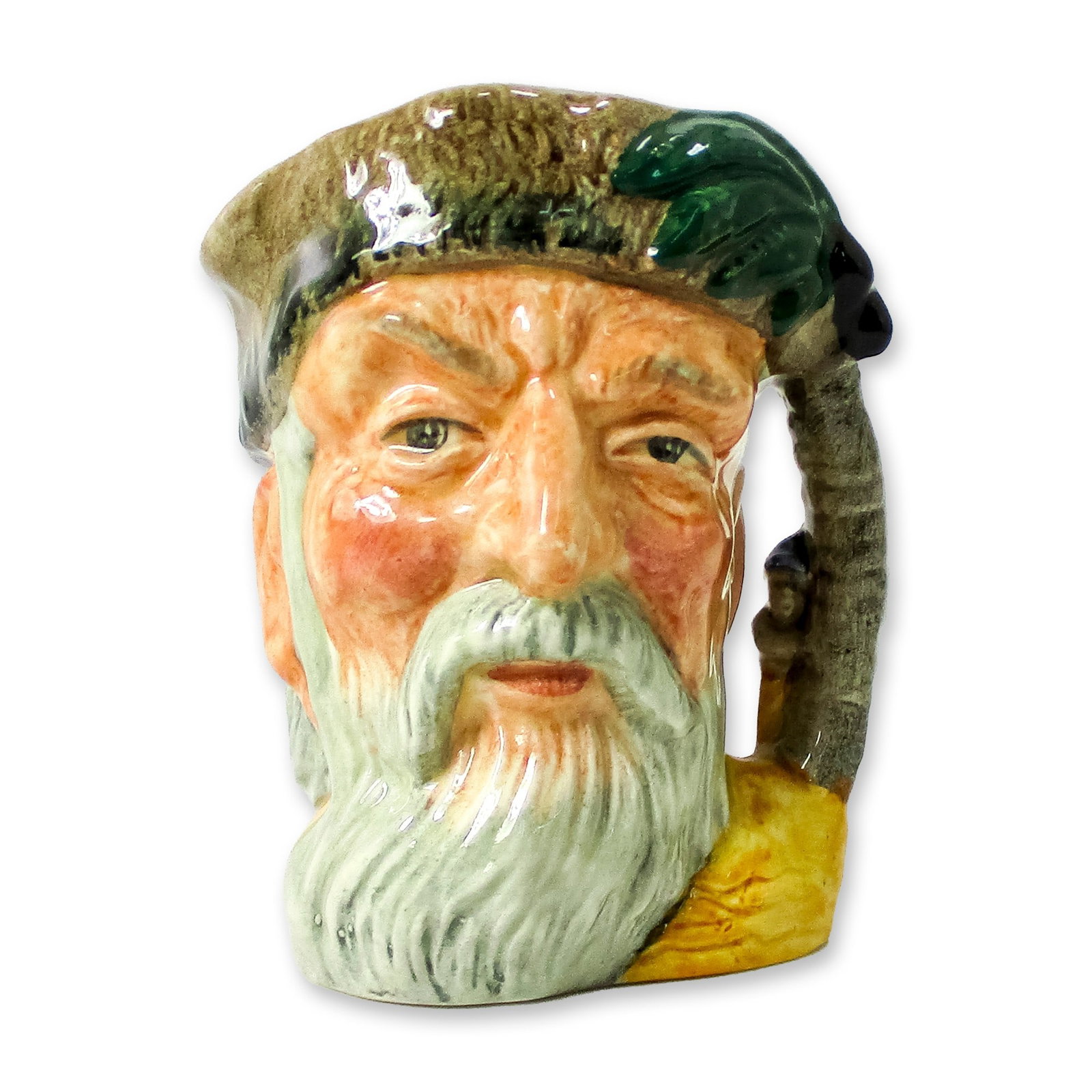 Robinson Crusoe D6539 - Small - Royal Doulton Character Jug: Variation One, with footprint on shoulder. Brown and green coloration. Series: Characters from Literature. Royal Doulton backstamp. Artist: Max Henk Dimensions: 4"H Date or Era: 1960 - 1982 Manufactur