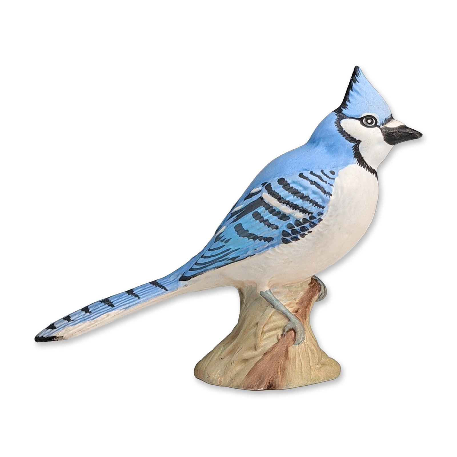 Beswick by Mr. Albert Hallam American Bird Series Figurine, Blue Jay 2188: Featuring a matte glaze finish. The bird is modeled in a lifelike downward-perching pose on a textured tree stump base, with hand-painted details including a prominent blue crest, black and white faci