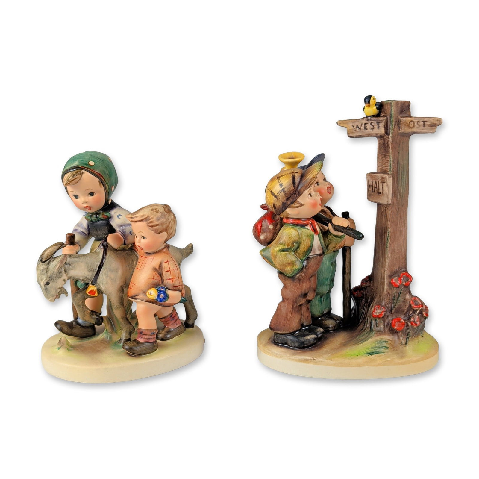 2pc Goebel Hummel Porcelain Figurines: Goebel Hummel. Two hand-painted glazed porcelain figurines including "Cross-roads" and "Homeward Bound." "Cross-roads" (model 331) depicts a young hiker with a walking stick and red backpack standing 