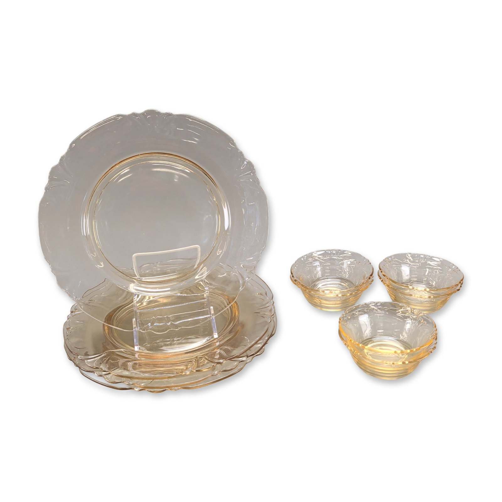 10pc Heisey Empress Sahara Yellow Depression Glass Set: Depression glassware set in transparent amber glass, Florentine No. 2 pattern, also known as Poppy. The set features an all-over floral and scrollwork motif with rounded scalloped rims. The base of ea