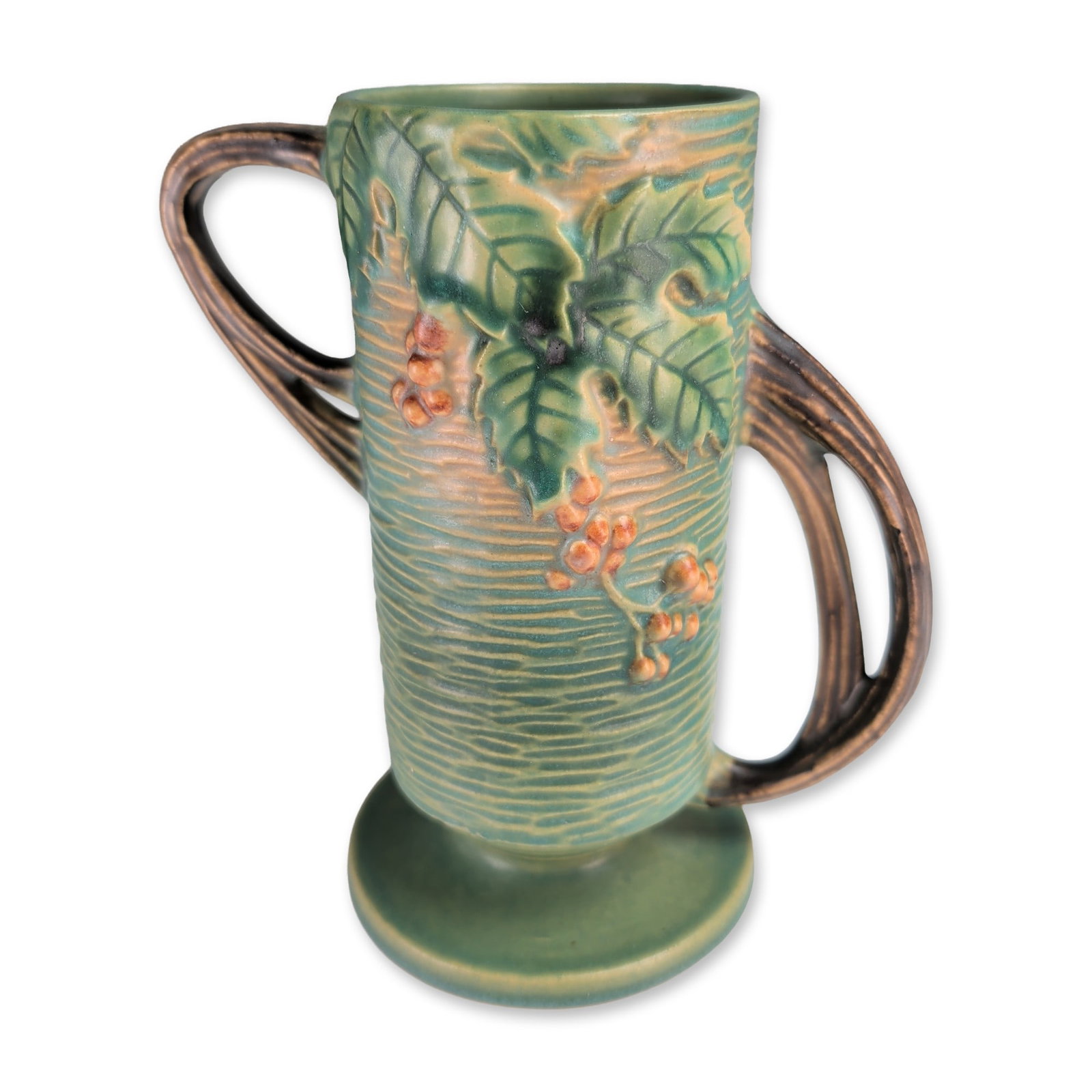Roseville Bushberry Pattern Green Art Pottery Vase: Roseville Pottery Bushberry pattern art pottery vase, produced in Zanesville, Ohio, circa 1941. The earthenware vessel features a matte green glaze with horizontal textured ribbing, decorated with a m