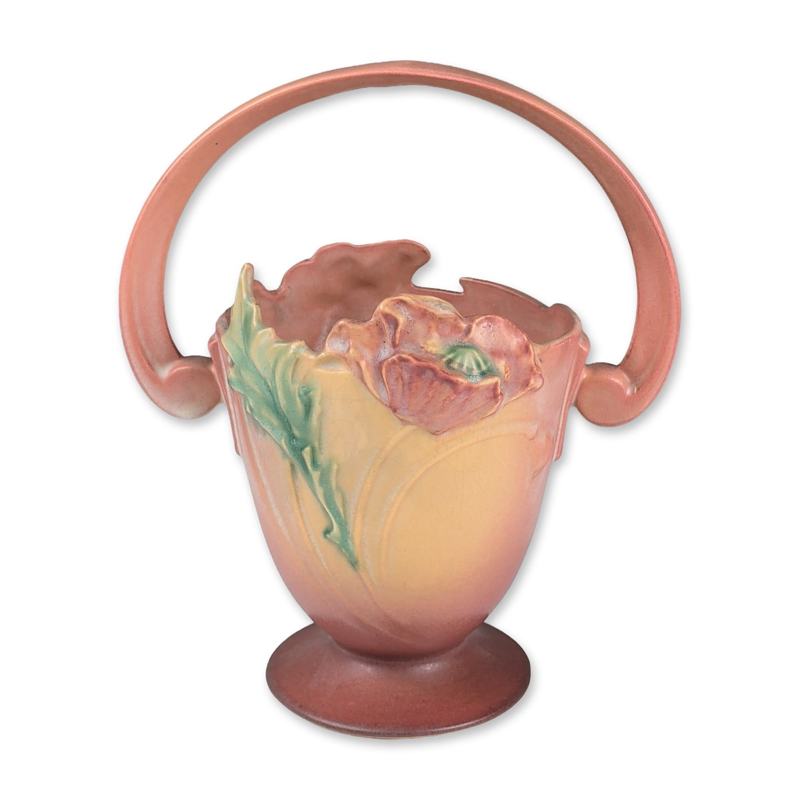 Roseville Pottery Basket, Pink Poppy: Roseville Pottery. Handled basket in earthenware, featuring the Poppy pattern introduced in 1938. The vessel is decorated in molded relief with a stylized poppy flower and green foliage against a blen
