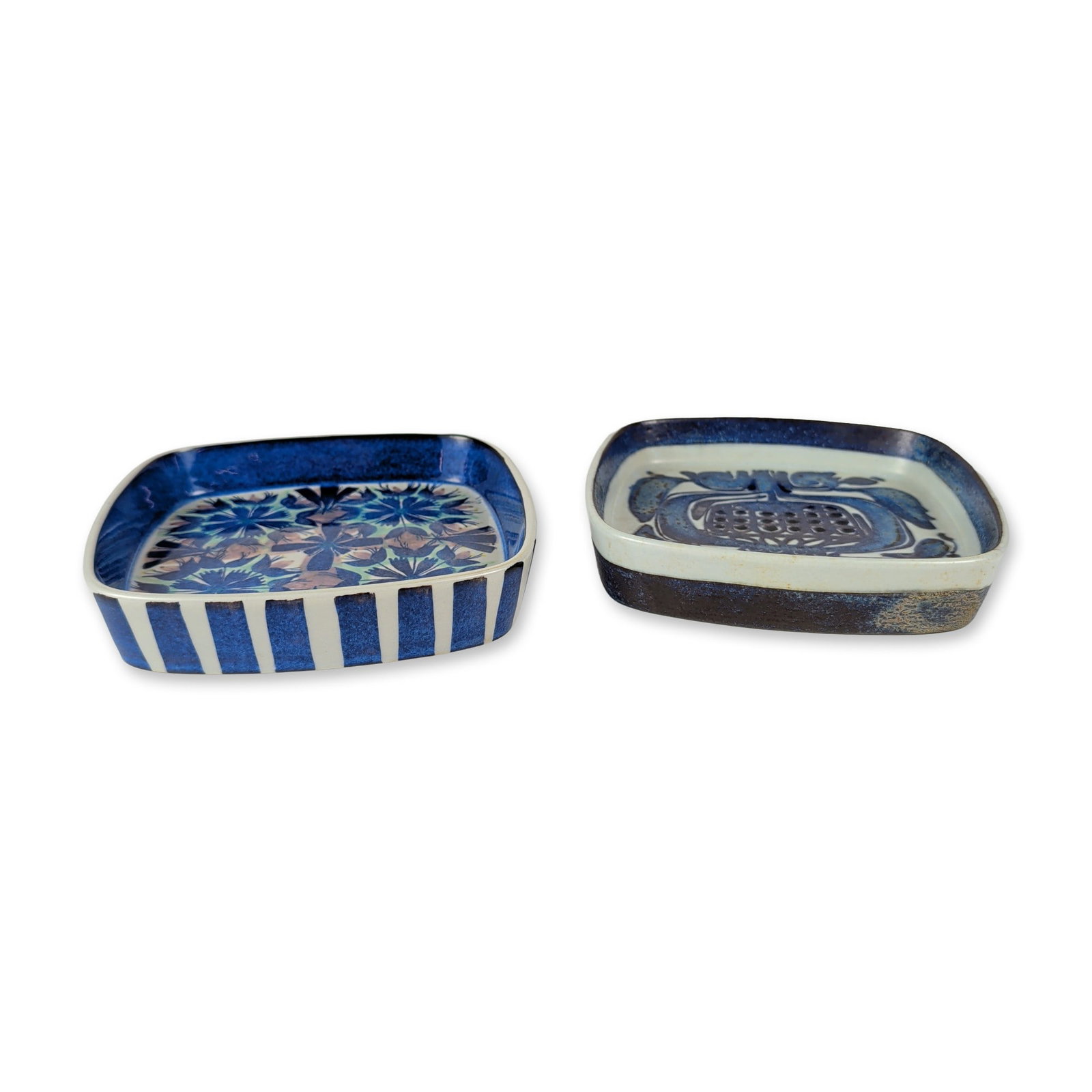 2pc Royal Copenhagen Aluminia Fajance Square Dishes: Pair of Royal Copenhagen Aluminia square fajance dishes in tin-glazed earthenware, one featuring a stylized floral pattern from the Tenera series and the other featuring a pomegranate motif from the B