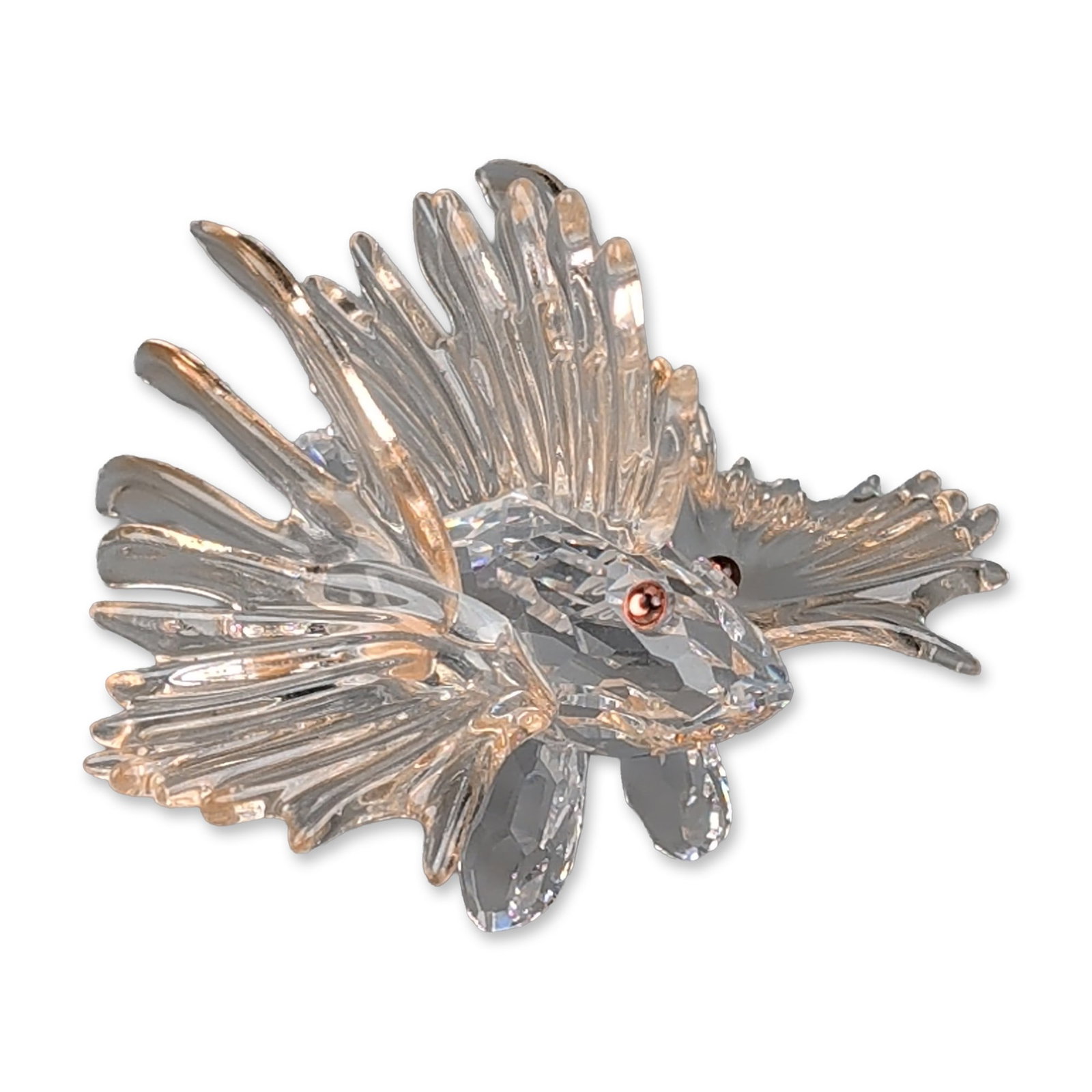 Swarovski Crystal Figurine, Lion Fish: Swarovski crystal South Sea Lion Fish figurine, part of the South Sea collection. The piece is constructed from faceted clear lead crystal, featuring warm amber-colored accents on the tips of the nume