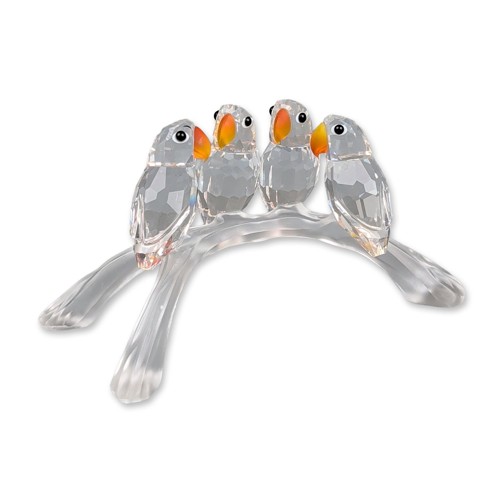 Swarovski Silver Crystal Figurine, Baby Lovebirds: Swarovski Silver Crystal figurine titled Baby Lovebirds, designed by Adi Stocker. The piece features four faceted clear crystal birds with orange-tinted beaks and black eyes, all perched upon a