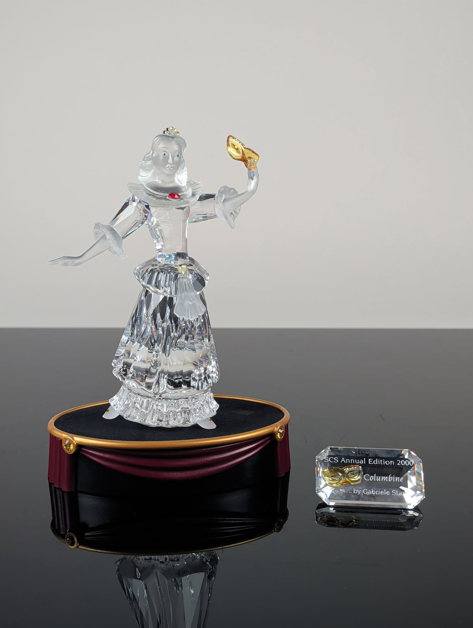 Swarovski 2000 SCS Columbine Crystal Figurine: Swarovski Austrian crystal figurine. Annual Edition 2000 Columbine from the Masquerade trilogy, designed by Gabriele Stamey. The figure is constructed from faceted lead crystal with frosted crystal