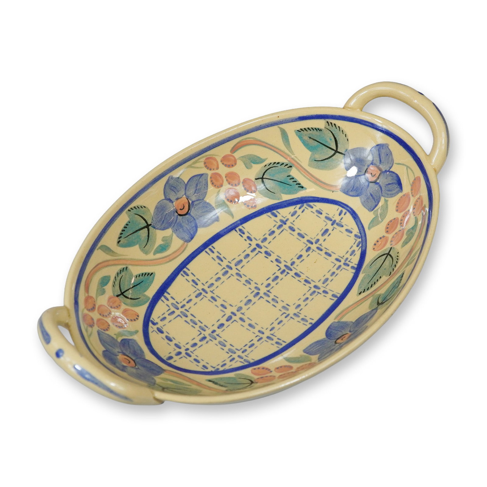Wedgwood Art Deco Polychrome Hand-Painted Queensware Oval Serving Bowl: A 20th-century English ceramic long bowl manufactured by the Wedgwood factory. This oval, shallow serving dish is crafted from a cream-toned earthenware body, likely Queensware, and features two integ