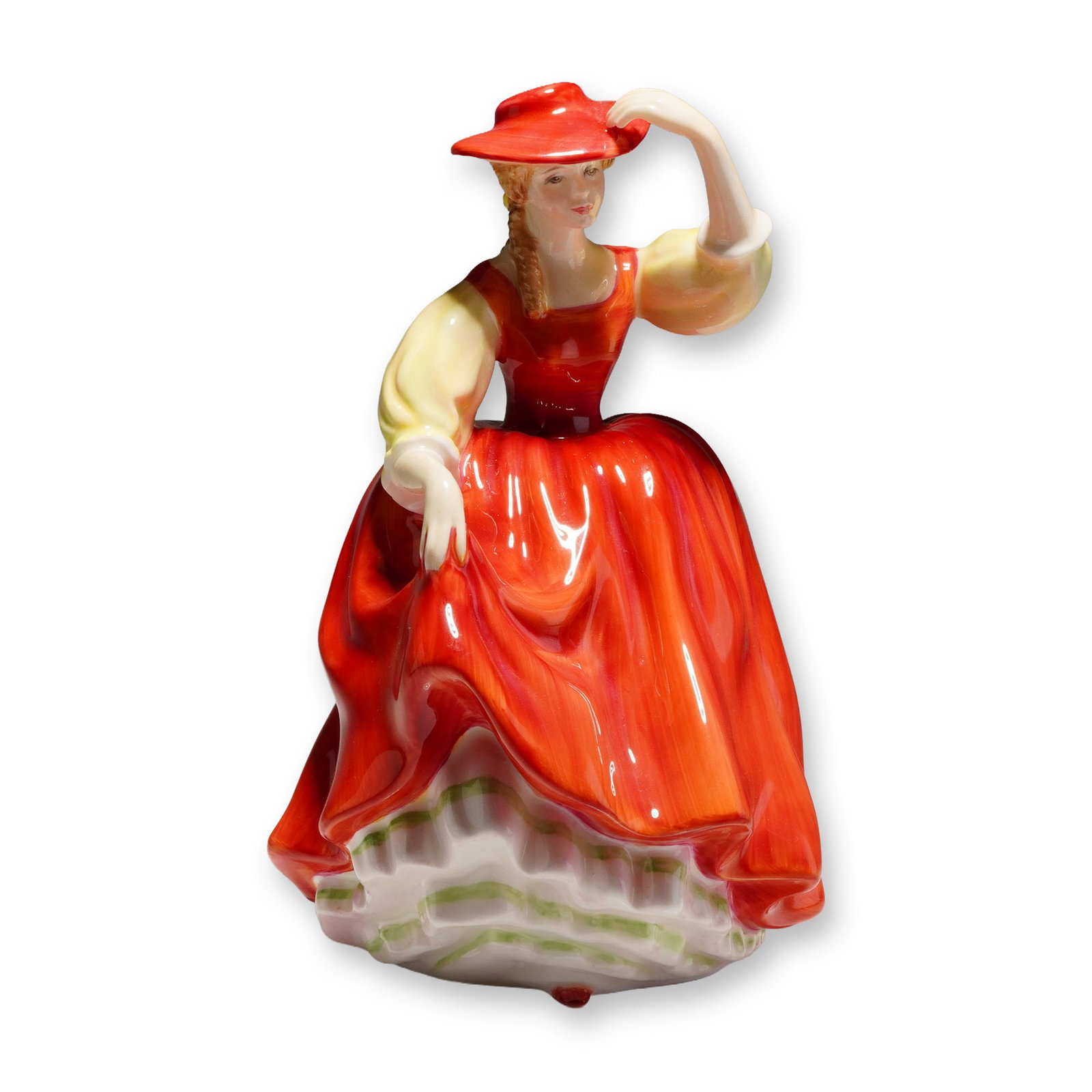 Royal Doulton Figurine Buttercup HN2399: A Royal Doulton bone china figurine, model HN 2399, titled "Buttercup." The piece was modelled by Peggy Davies and copyrighted 1963. The figurine depicts a young woman dressed in a voluminous, high-gl